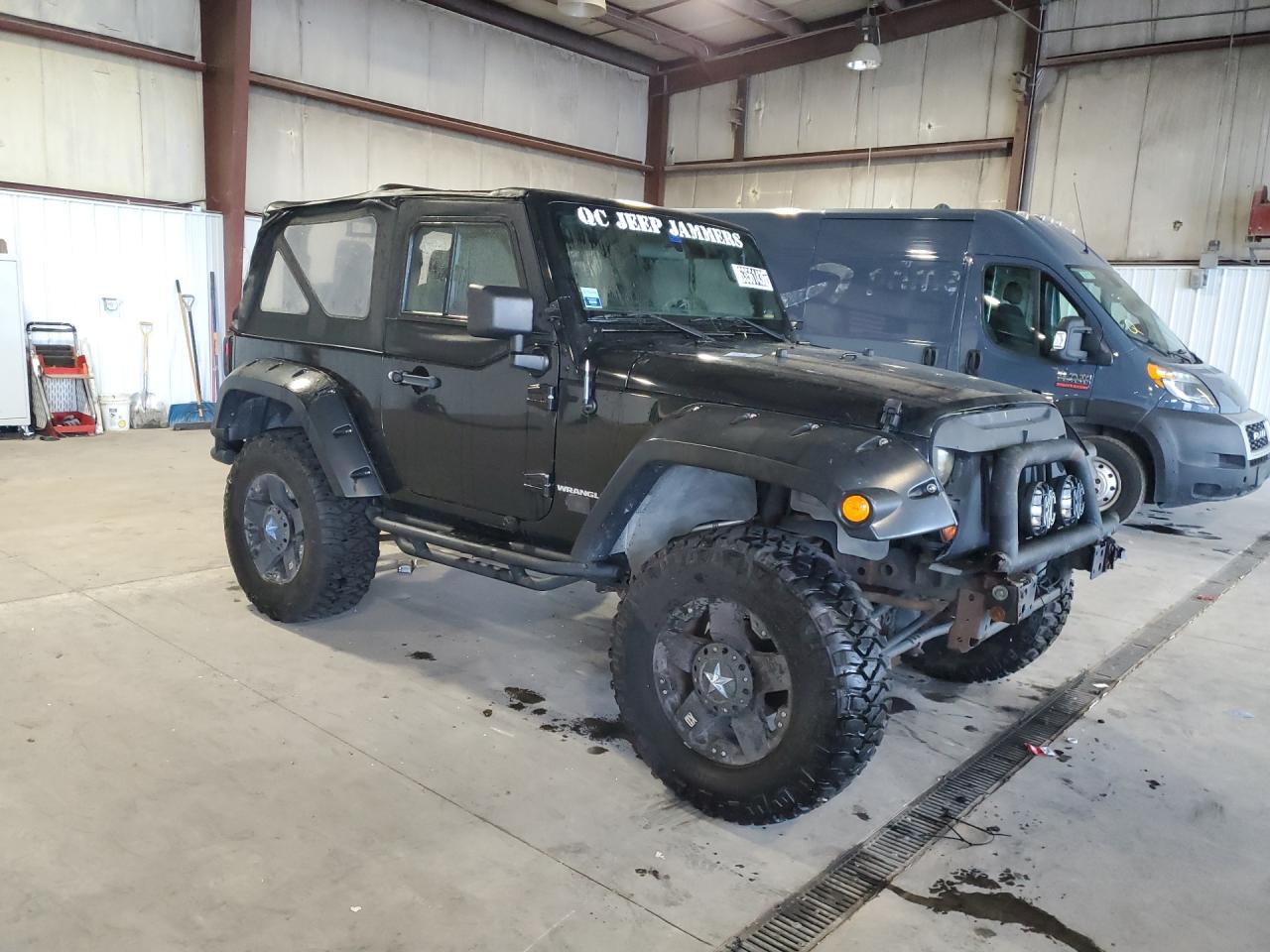 2012 Jeep Wrangler Sport Black vin: 1C4AJWAG8CL243297 Damage: Right Rear Wheel, Aftermarket, Acceptable