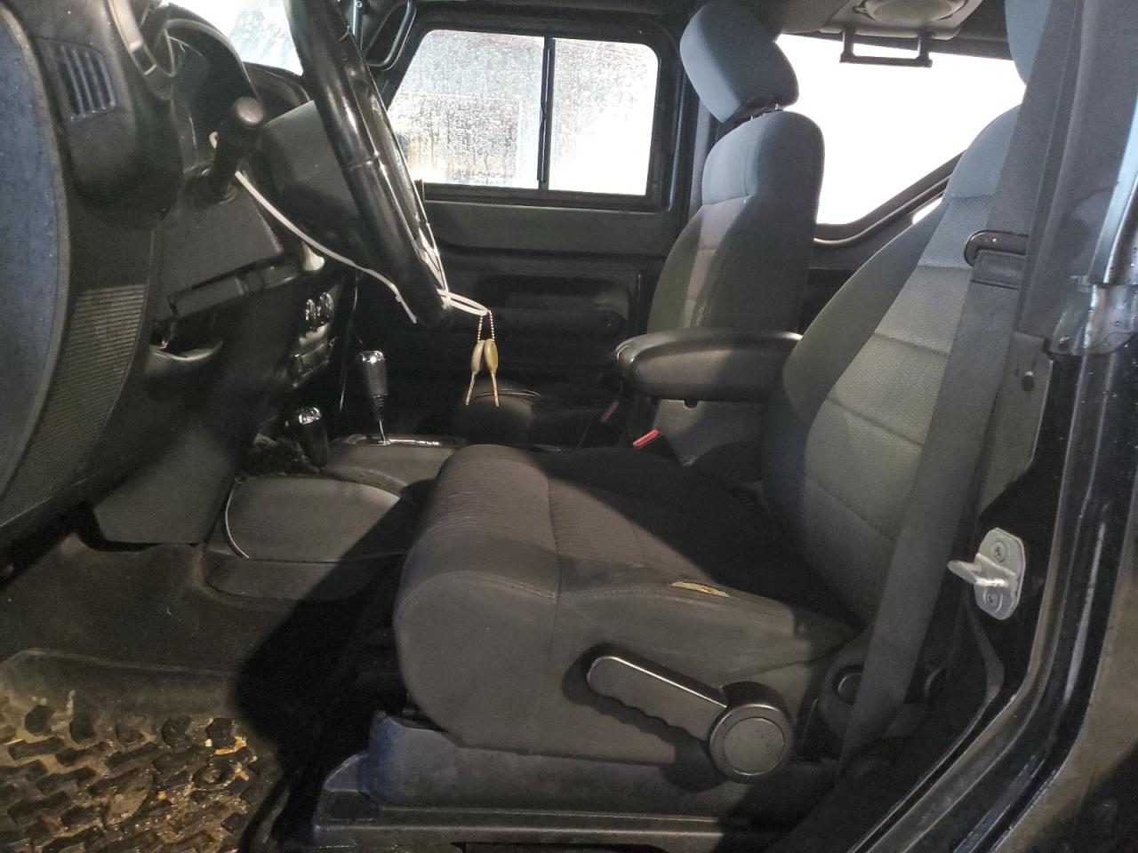 2012 Jeep Wrangler Sport Black vin: 1C4AJWAG8CL243297 Damage: Left Front Seat Cushion, Worn, Replacement Required