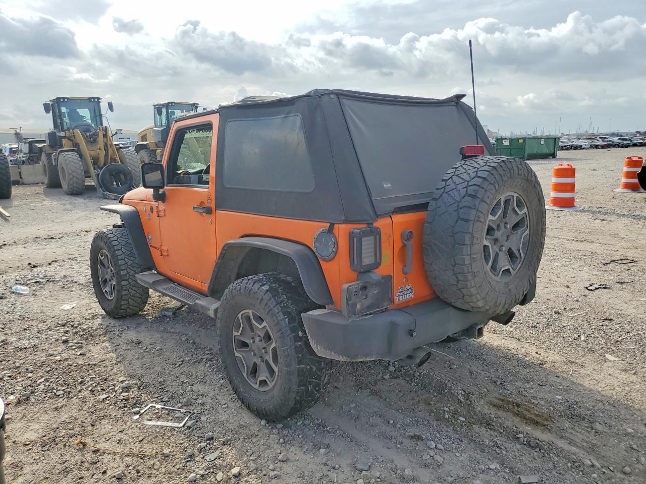 2012 Jeep Wrangler Sport Orange vin: 1C4AJWAG8CL280429