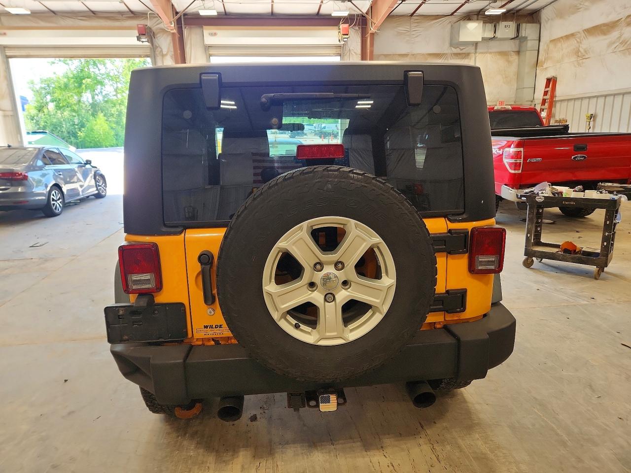 2012 Jeep Wrangler Sport Yellow vin: 1C4AJWAGXCL119788