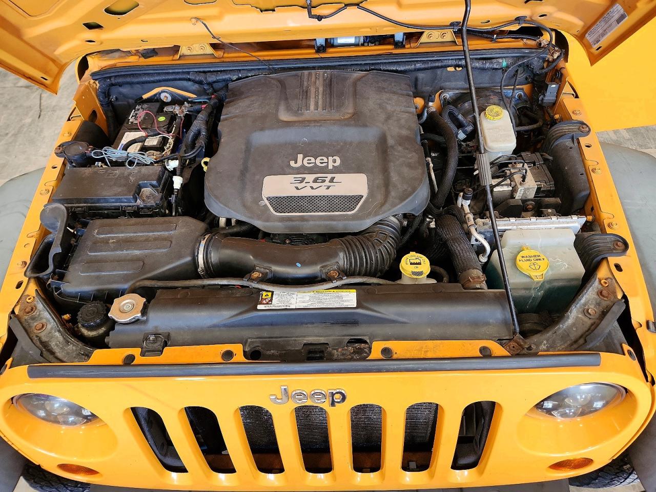 2012 Jeep Wrangler Sport Yellow vin: 1C4AJWAGXCL119788
