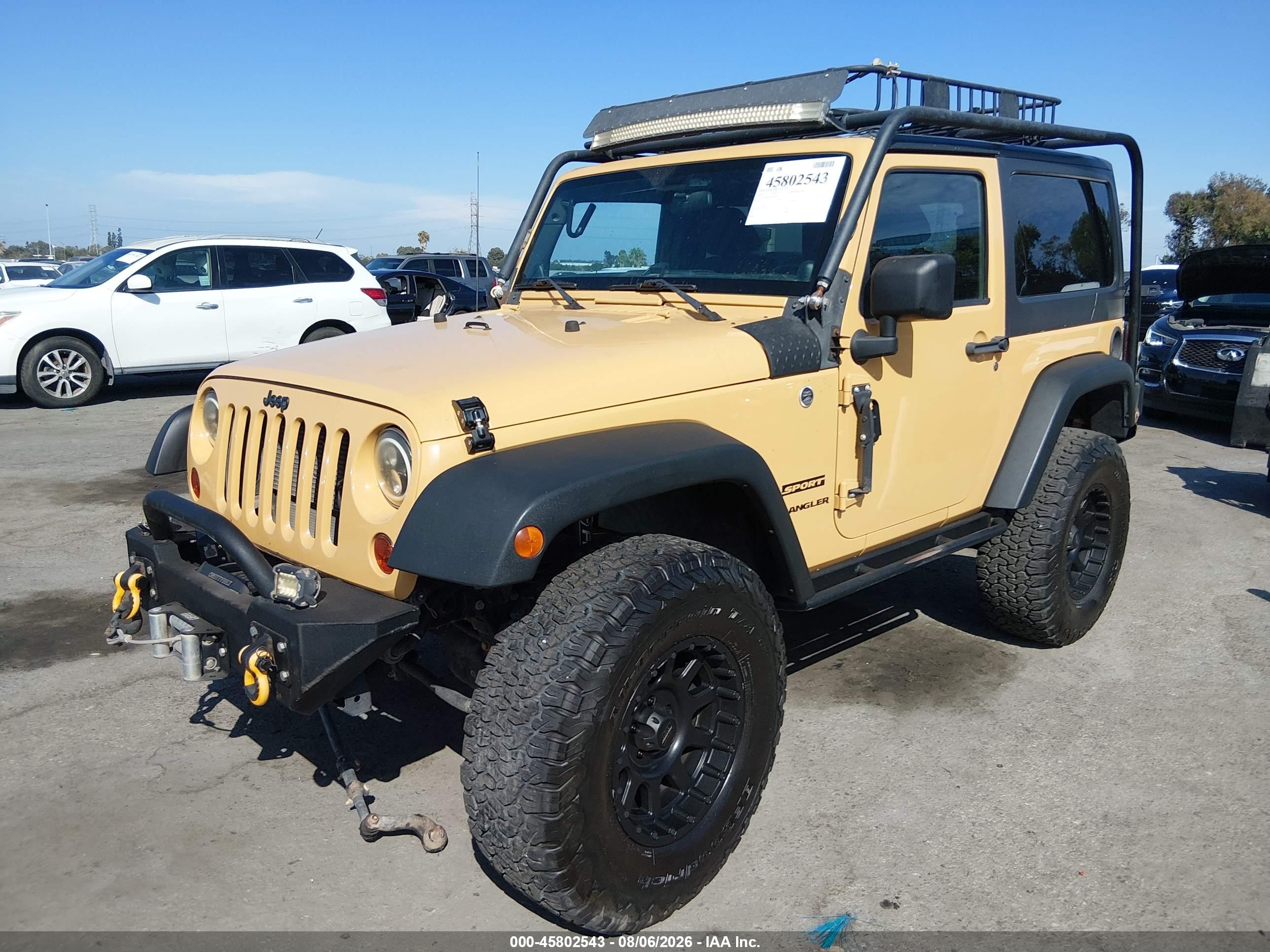 2013 Jeep Wrangler Sport Beige vin: 1C4AJWAGXDL686939