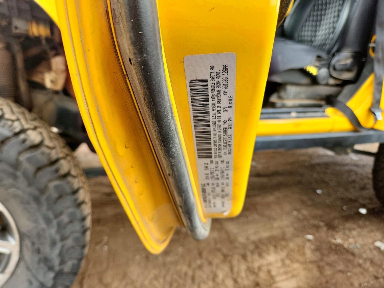 2015 Jeep Wrangler Rubicon Yellow vin: 1C4BJWCG1FL540868