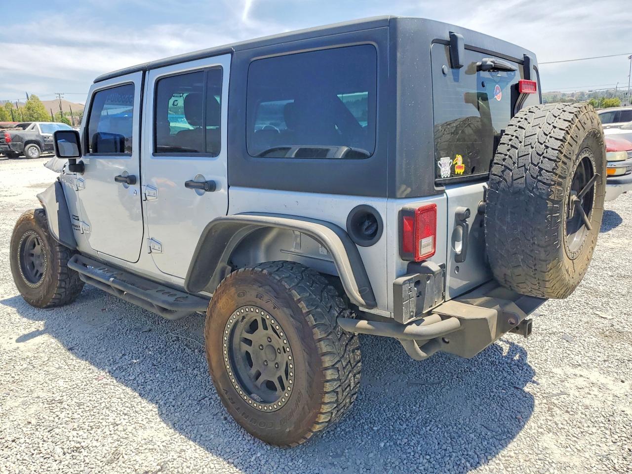 2012 Jeep Wrangler Unlimited Sport Silver vin: 1C4BJWDG0CL178963