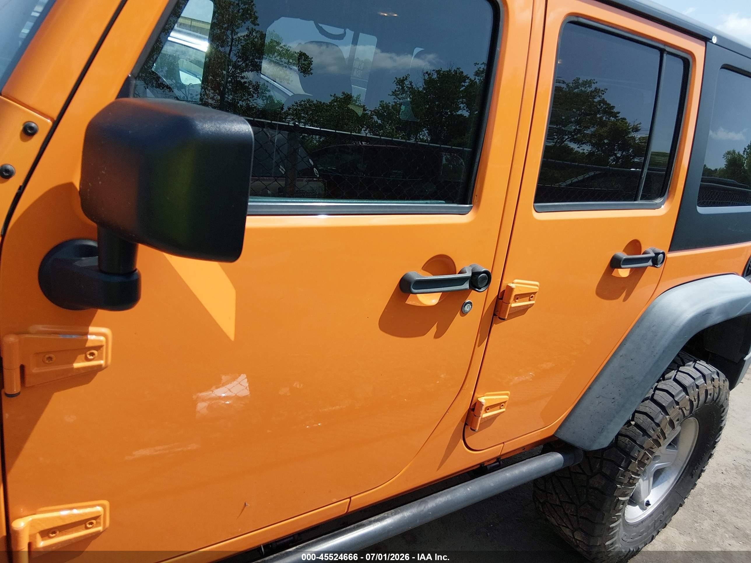 2012 Jeep Wrangler Unlimited Sport Orange vin: 1C4BJWDG0CL222136