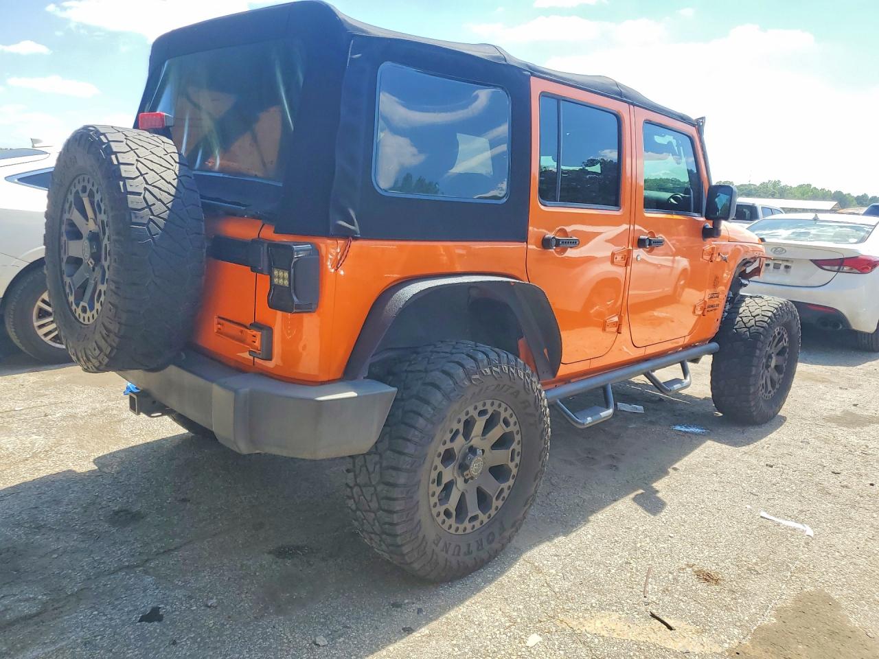 2012 Jeep Wrangler Unlimited Sport Orange vin: 1C4BJWDG0CL269148