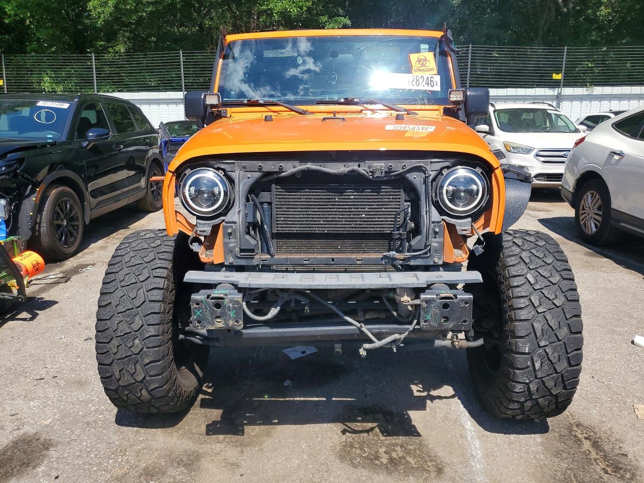 2012 Jeep Wrangler Unlimited Sport Orange vin: 1C4BJWDG0CL269148