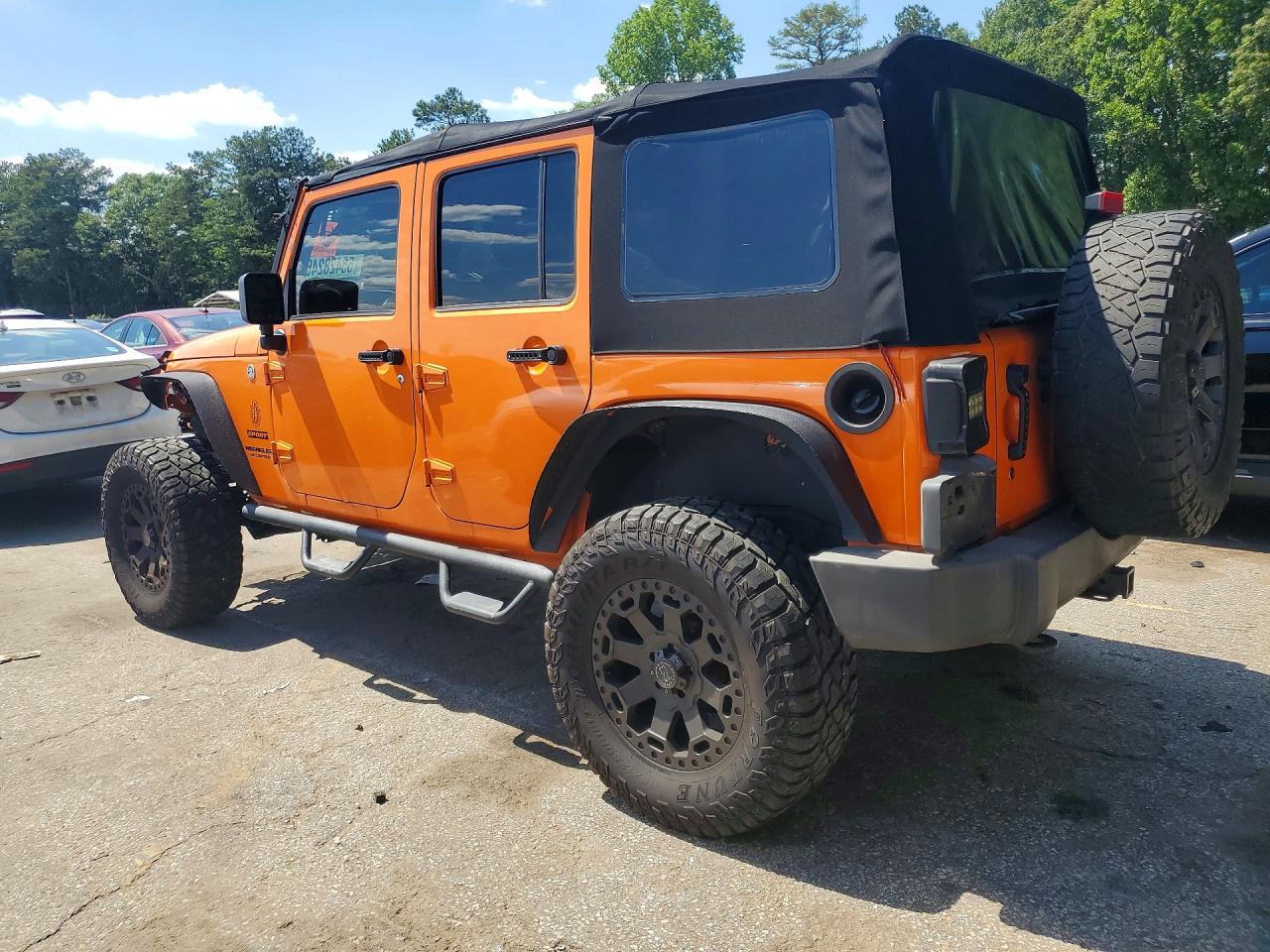 2012 Jeep Wrangler Unlimited Sport Orange vin: 1C4BJWDG0CL269148