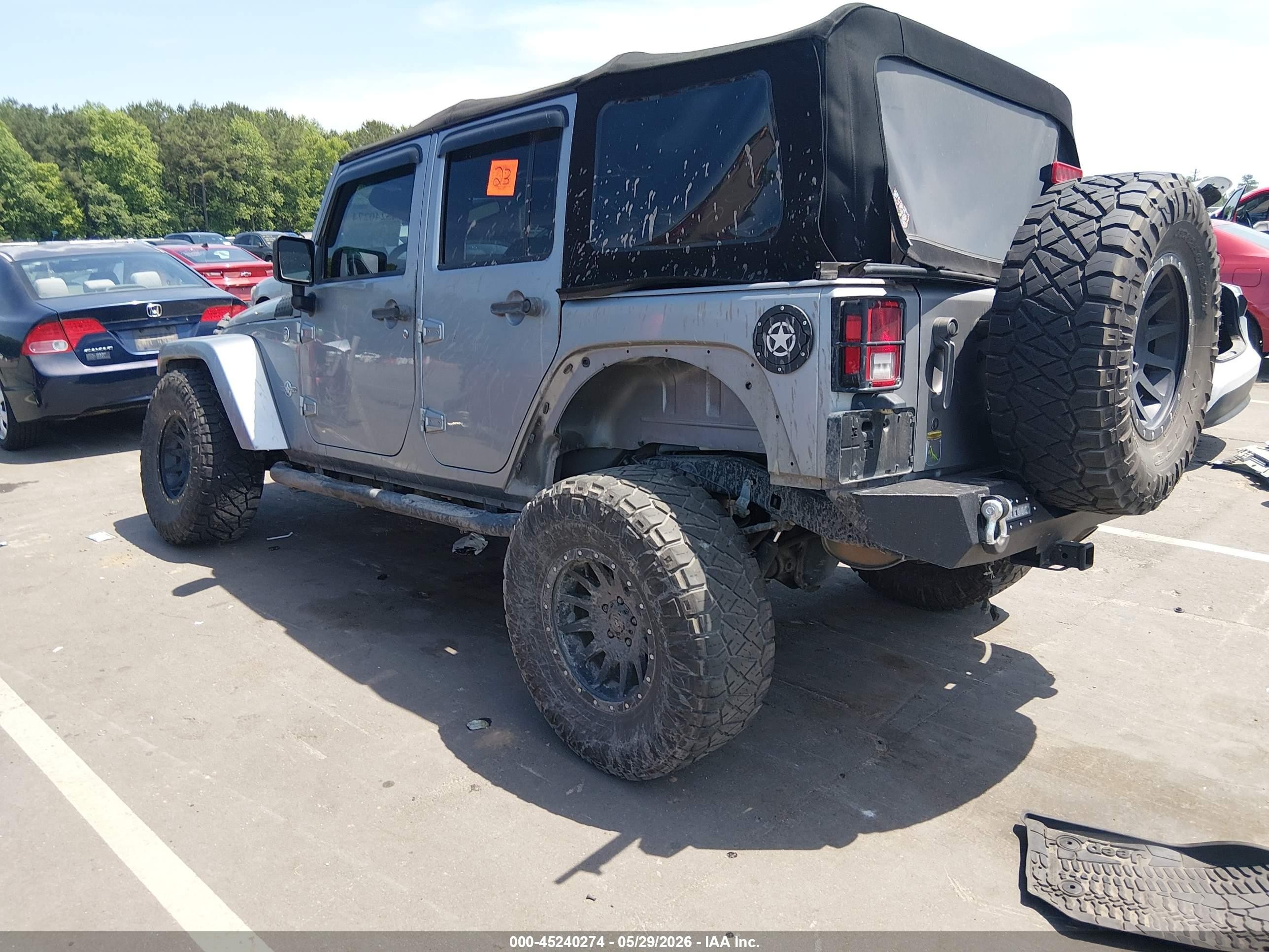 2014 Jeep Wrangler Unlimited Freedom Edition Silver vin: 1C4BJWDG0EL233379