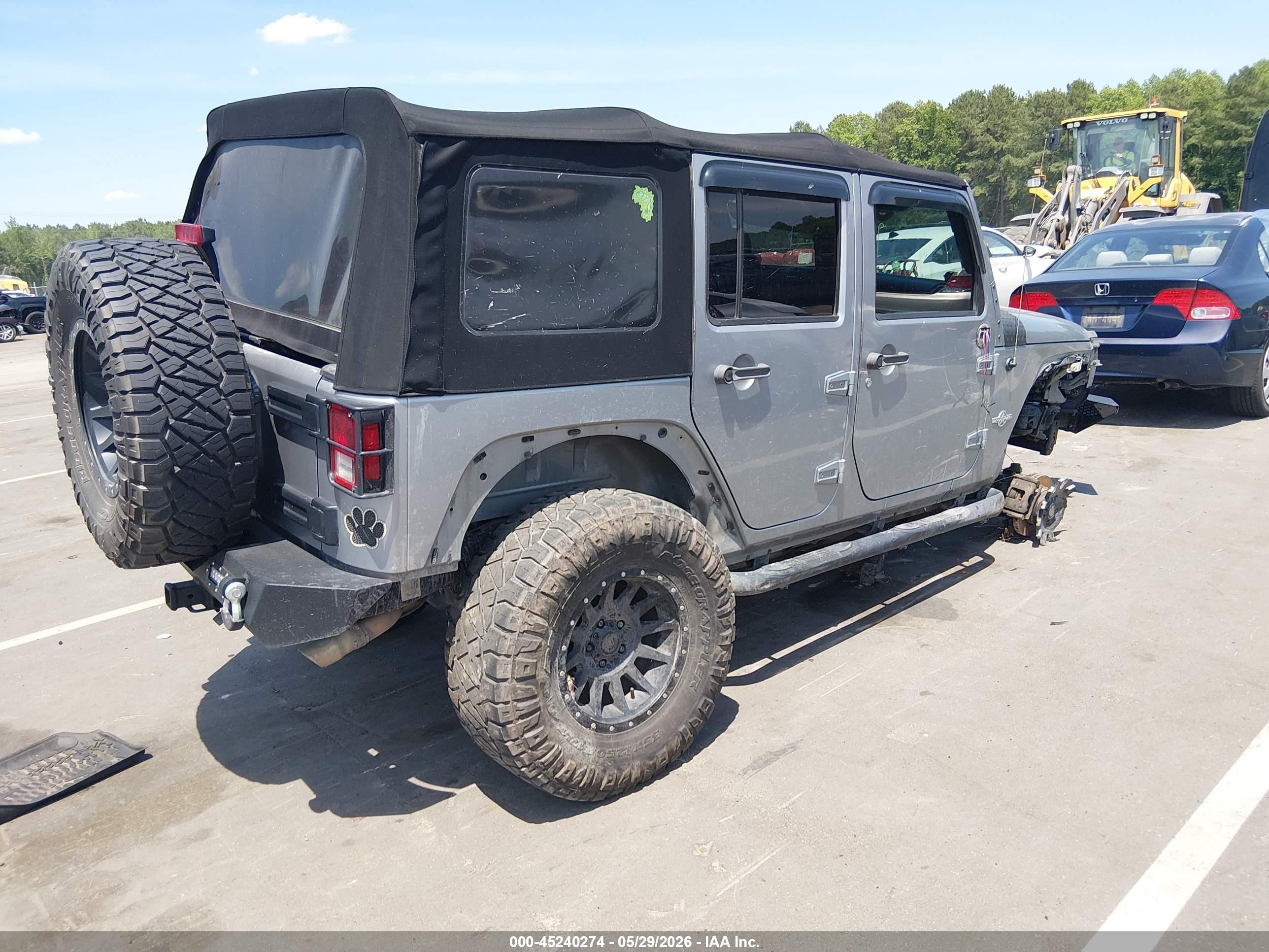 2014 Jeep Wrangler Unlimited Freedom Edition Silver vin: 1C4BJWDG0EL233379