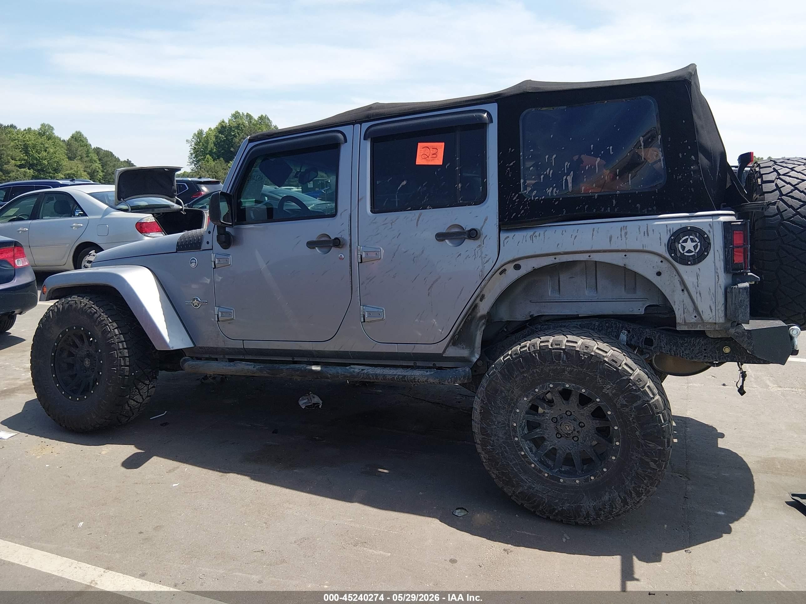 2014 Jeep Wrangler Unlimited Freedom Edition Silver vin: 1C4BJWDG0EL233379