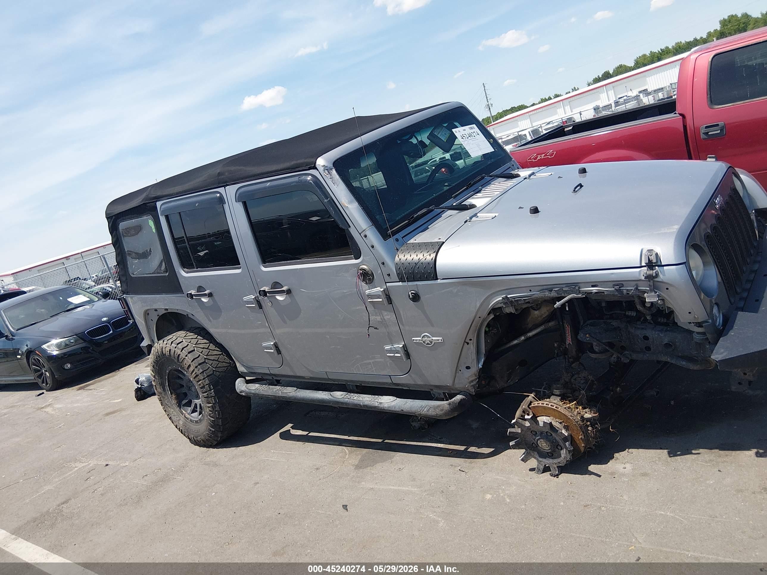 2014 Jeep Wrangler Unlimited Freedom Edition Silver vin: 1C4BJWDG0EL233379
