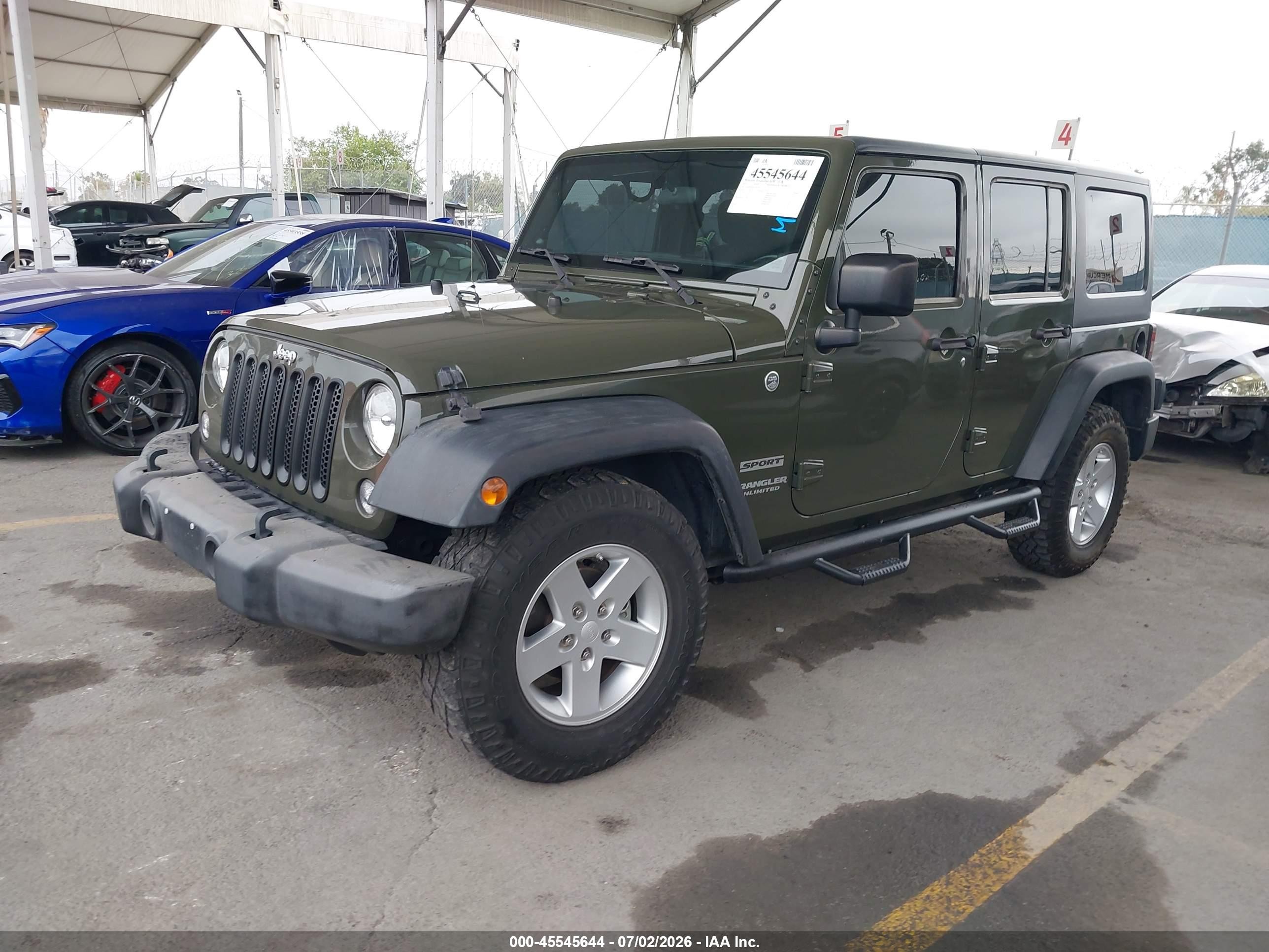 2015 Jeep Wrangler Unlimited Sport Green vin: 1C4BJWDG0FL707770