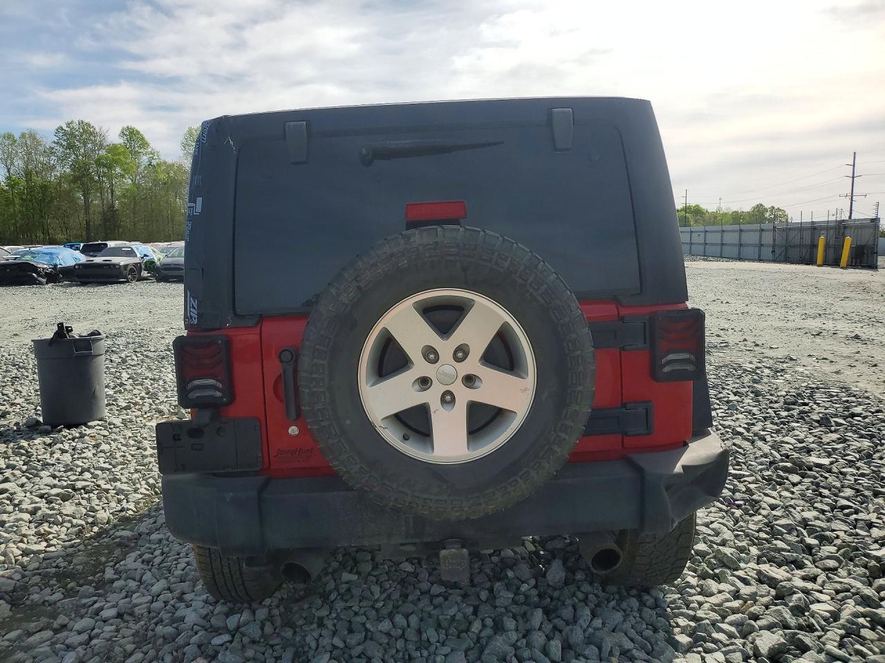 2012 Jeep Wrangler Unlimited Sport Red vin: 1C4BJWDG1CL139282