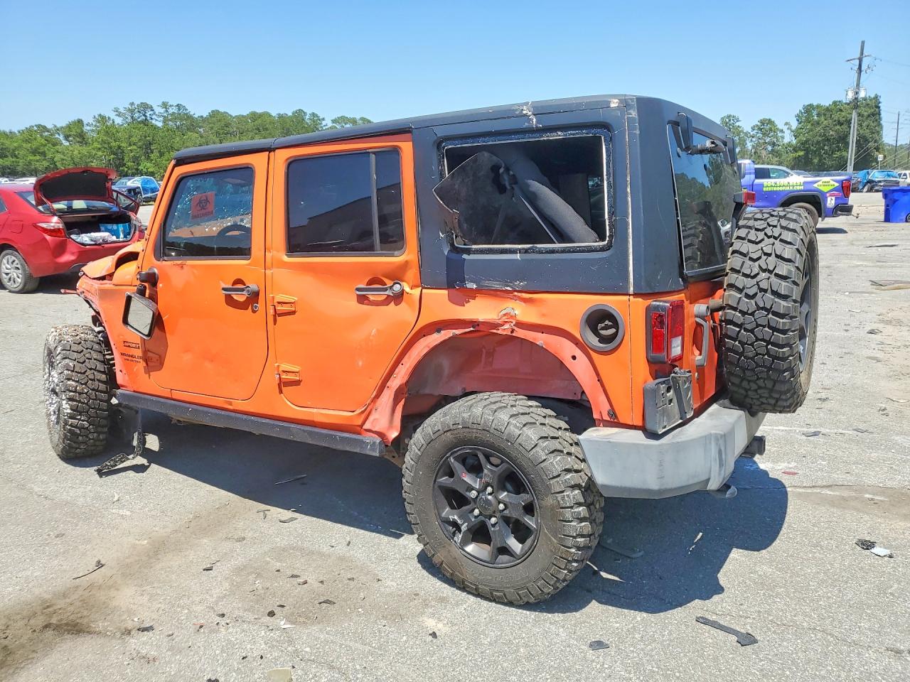 2015 Jeep Wrangler Unlimited Sport Orange vin: 1C4BJWDG1FL674438