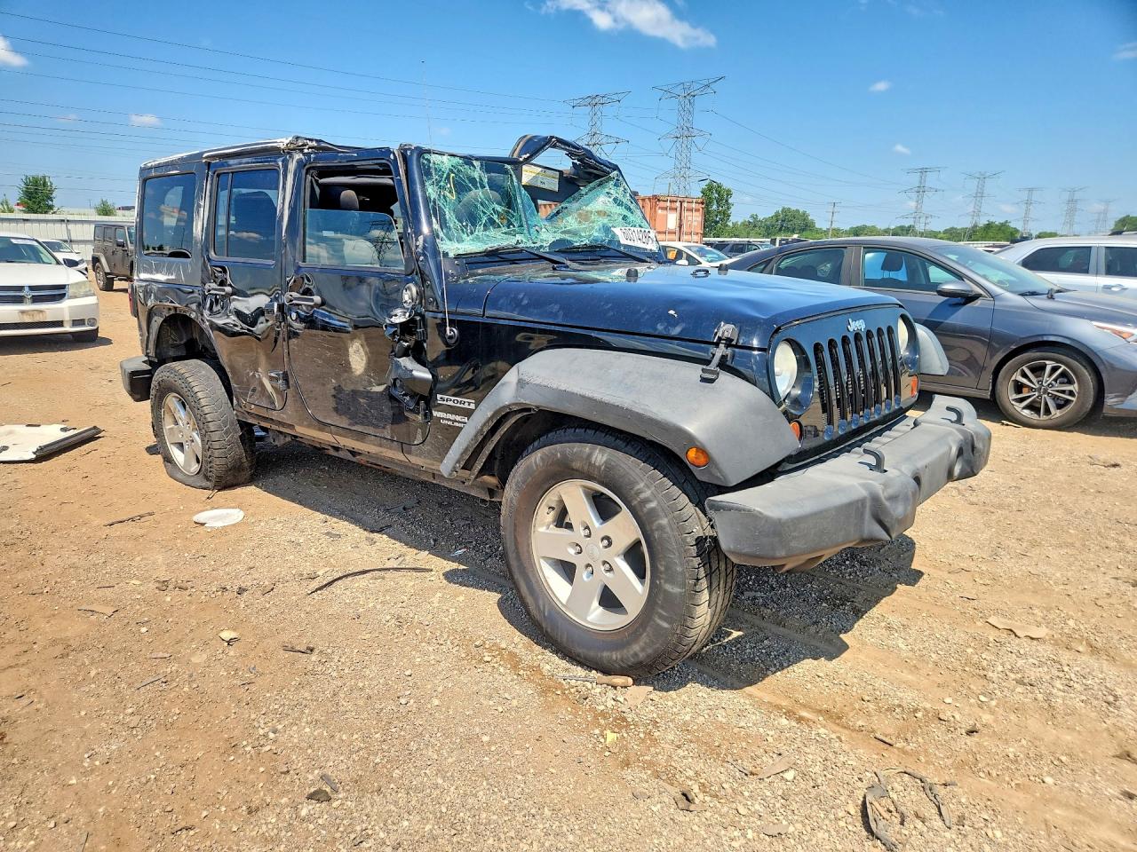 2012 Jeep Wrangler Unlimited Sport Black vin: 1C4BJWDG2CL200753