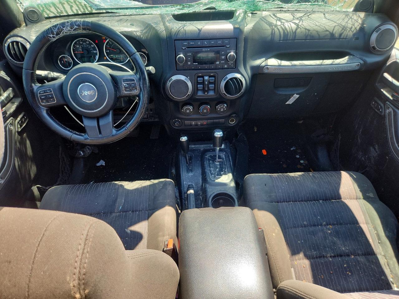 2012 Jeep Wrangler Unlimited Sport Black vin: 1C4BJWDG2CL200753
