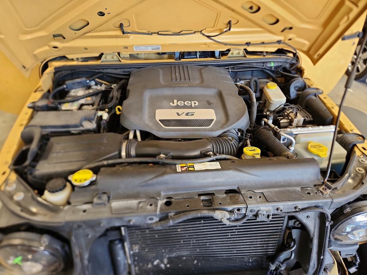2014 Jeep Wrangler Unlimited Sport Yellow vin: 1C4BJWDG2EL139293