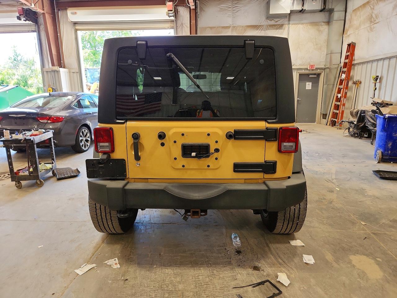 2014 Jeep Wrangler Unlimited Sport Yellow vin: 1C4BJWDG2EL139293