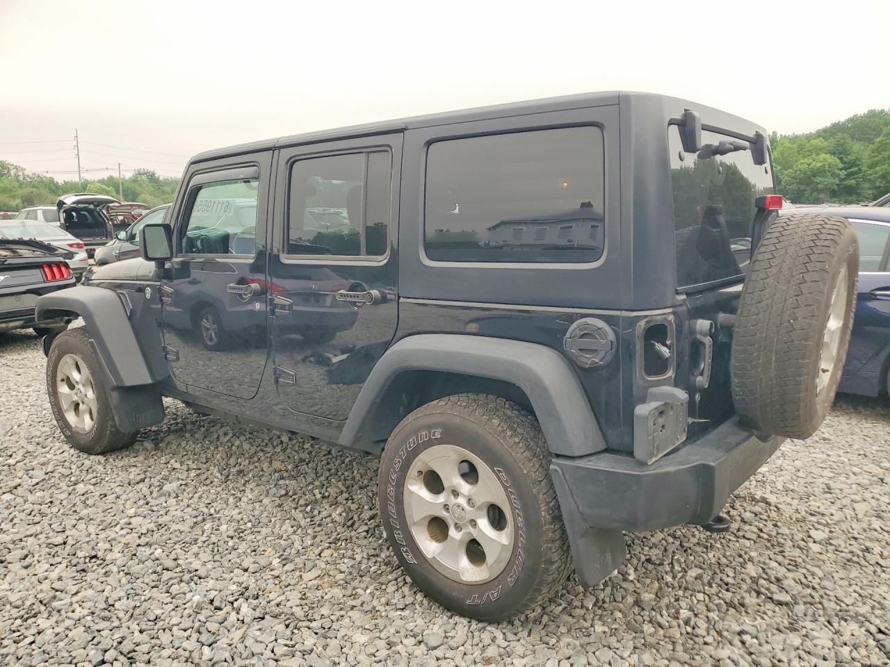 2015 Jeep Wrangler Unlimited Sport Black vin: 1C4BJWDG2FL513757