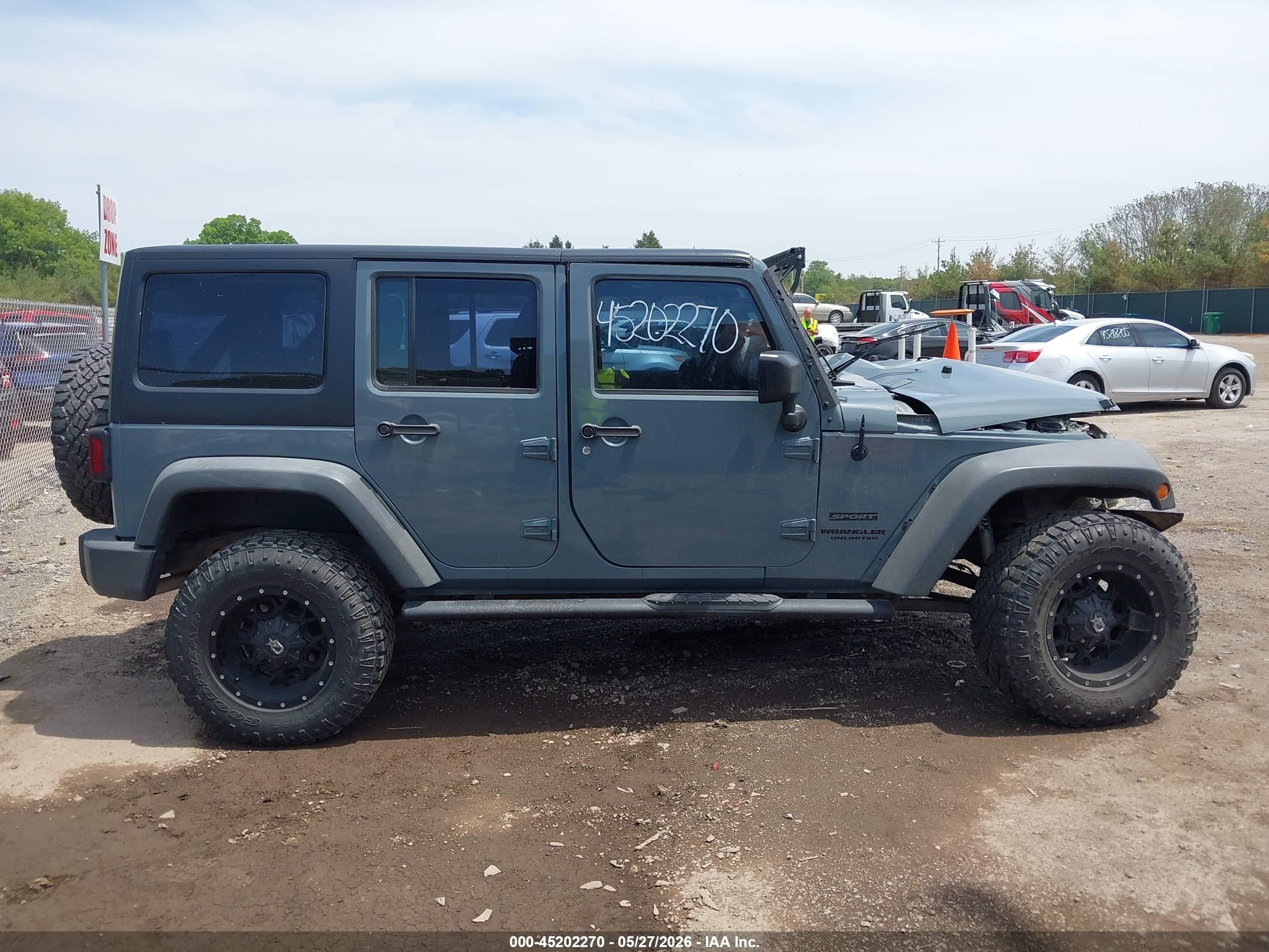 2015 Jeep Wrangler Unlimited Sport Gray vin: 1C4BJWDG2FL642730