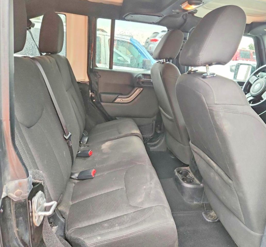 2015 Jeep Wrangler Unlimited Sport Черный vin: 1C4BJWDG2FL693676