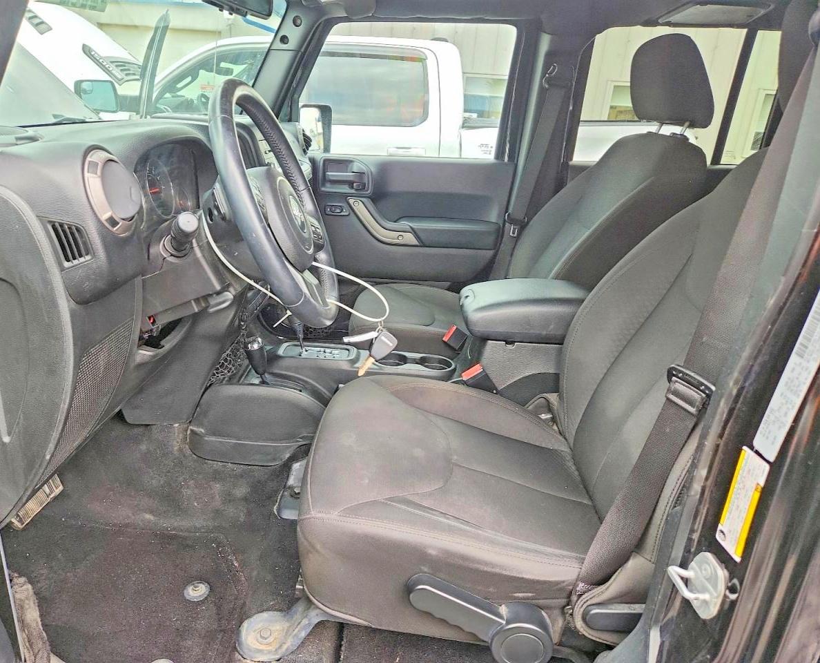 2015 Jeep Wrangler Unlimited Sport Черный vin: 1C4BJWDG2FL693676