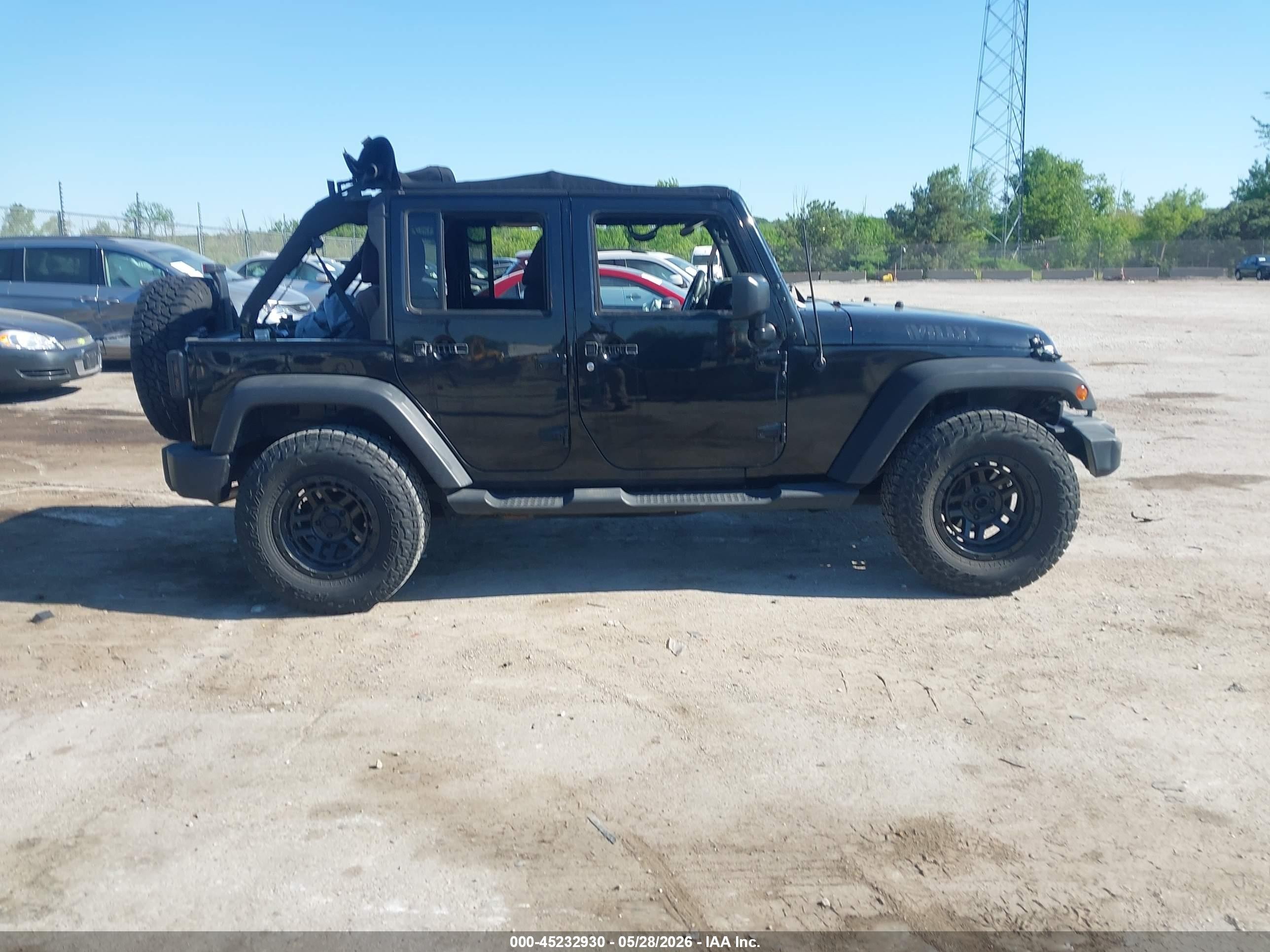 2015 Jeep Wrangler Unlimited Sport Black vin: 1C4BJWDG2FL695279
