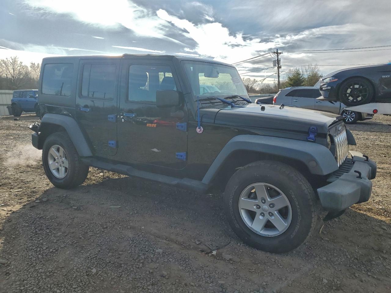 2012 Jeep Wrangler Unlimited Sport Black vin: 1C4BJWDG3CL206013