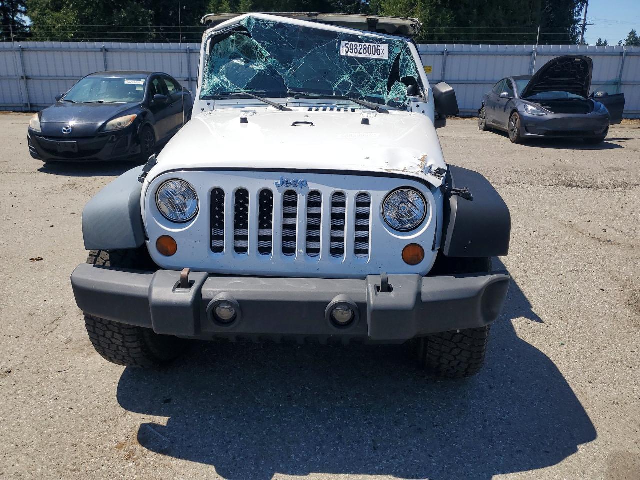 2012 Jeep Wrangler Unlimited Sport White vin: 1C4BJWDG3CL208487