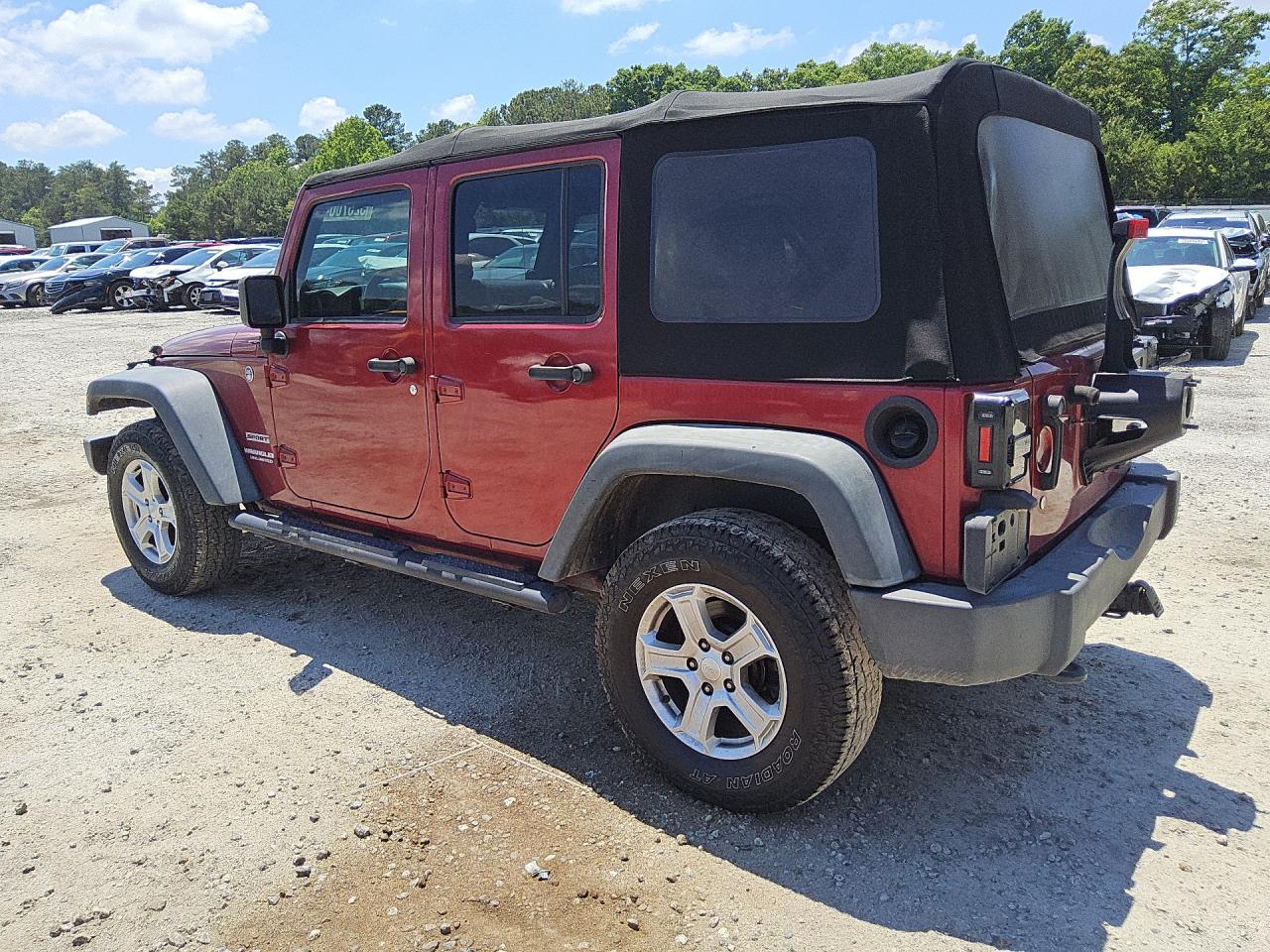 2013 Jeep Wrangler Unlimited Sport Burgundy vin: 1C4BJWDG3DL509732 Damage: Left Front Tire, Worn, Replacement Required