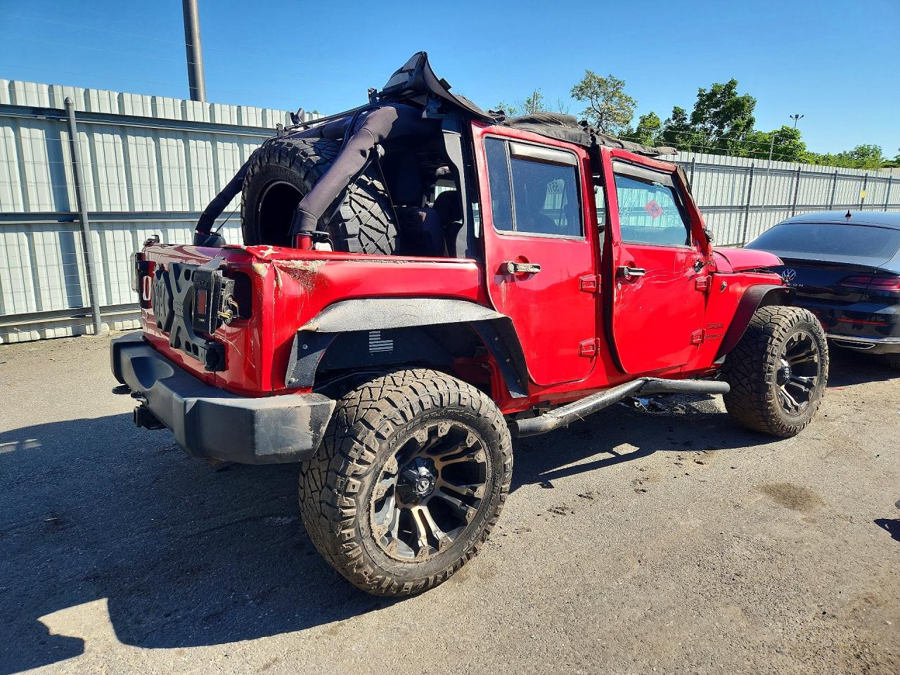 2015 Jeep Wrangler Unlimited Sport Red vin: 1C4BJWDG3FL503111