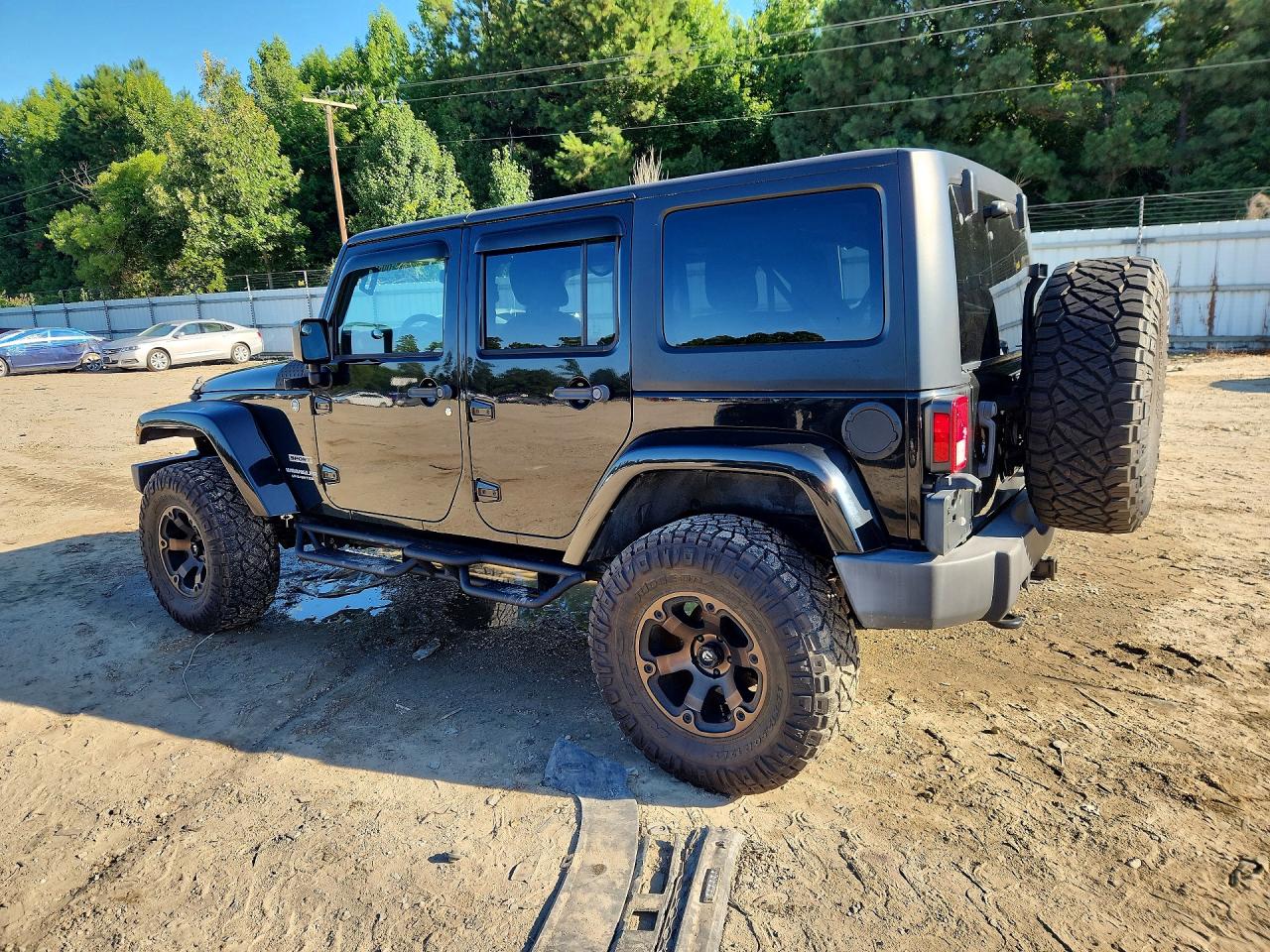 2015 Jeep Wrangler Unlimited Sport Black vin: 1C4BJWDG3FL649928