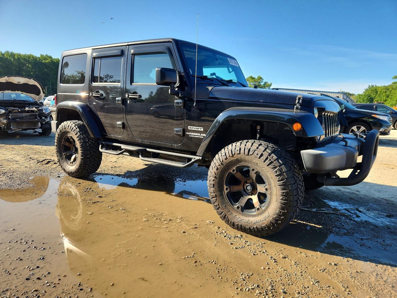 2015 Jeep Wrangler Unlimited Sport Black vin: 1C4BJWDG3FL649928