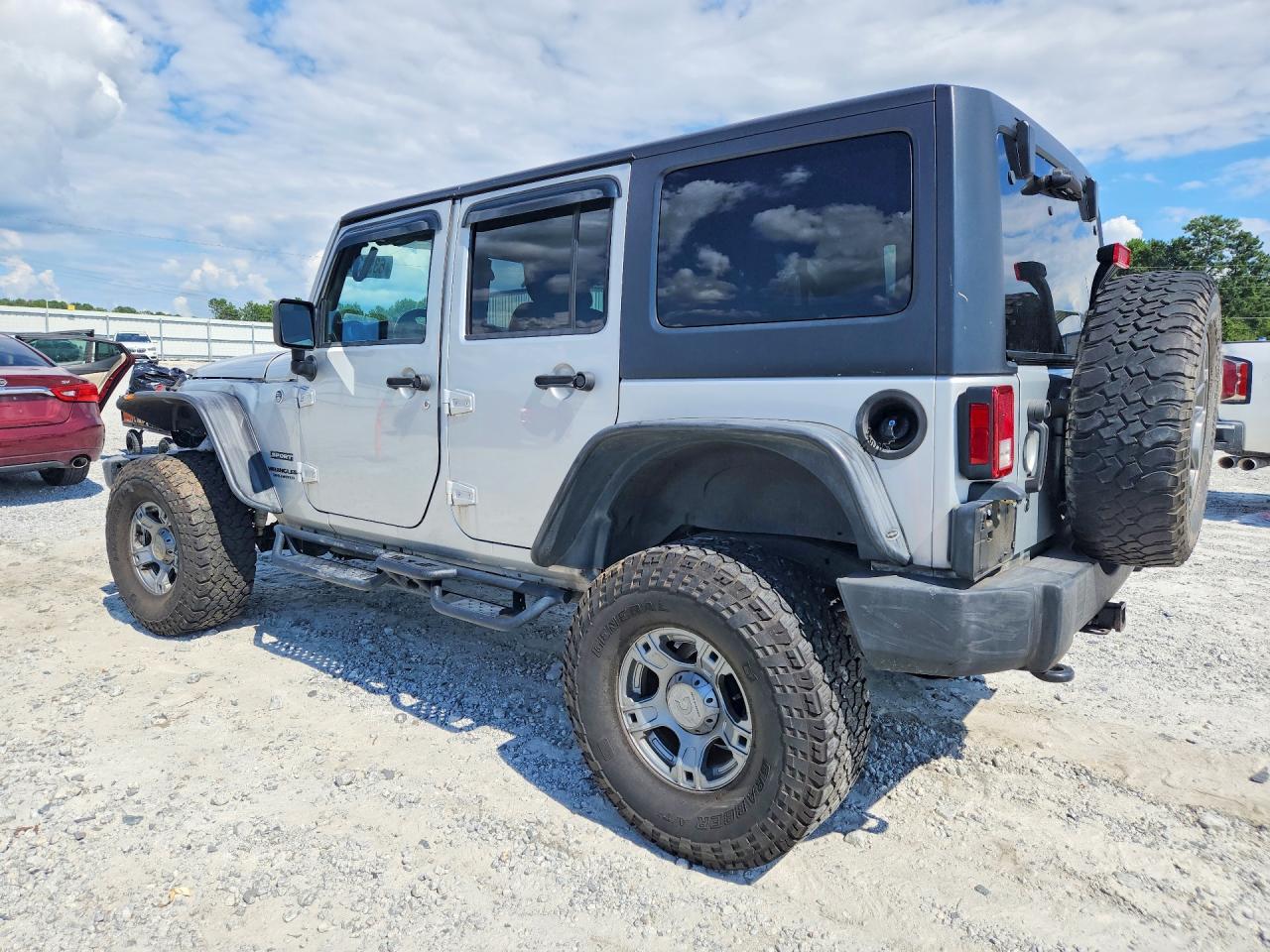 2012 Jeep Wrangler Unlimited Sport Silver vin: 1C4BJWDG4CL141088