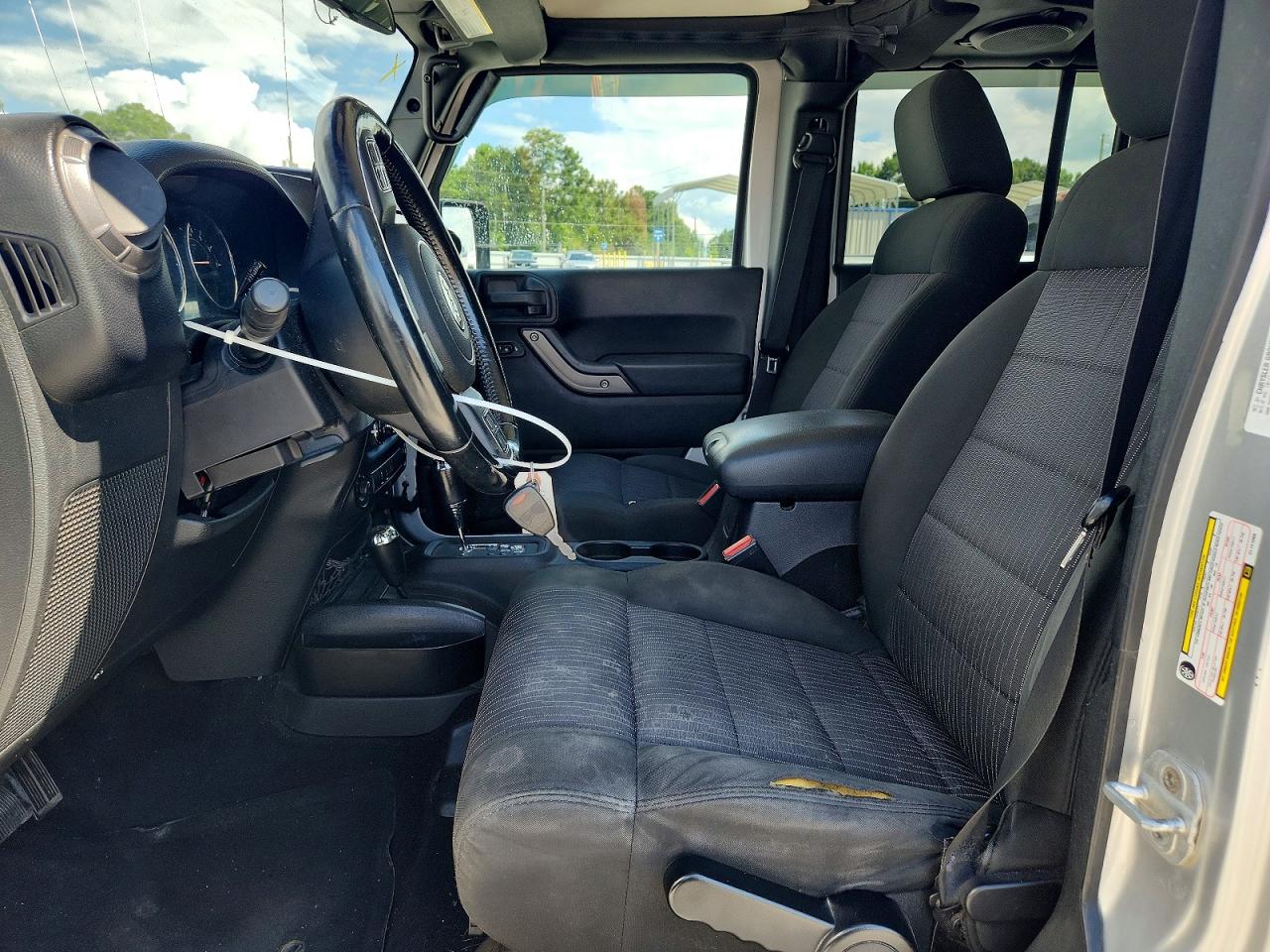 2012 Jeep Wrangler Unlimited Sport Silver vin: 1C4BJWDG4CL141088