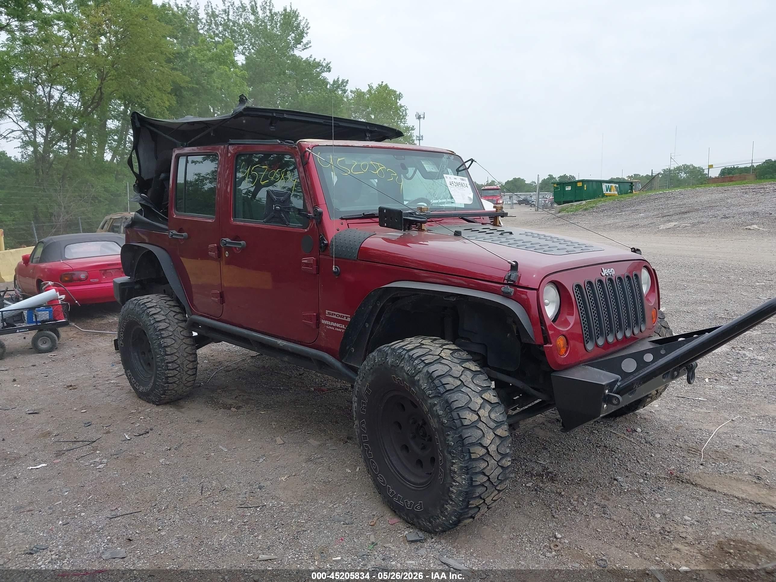 2012 Jeep Wrangler Unlimited Sport Red vin: 1C4BJWDG4CL227856
