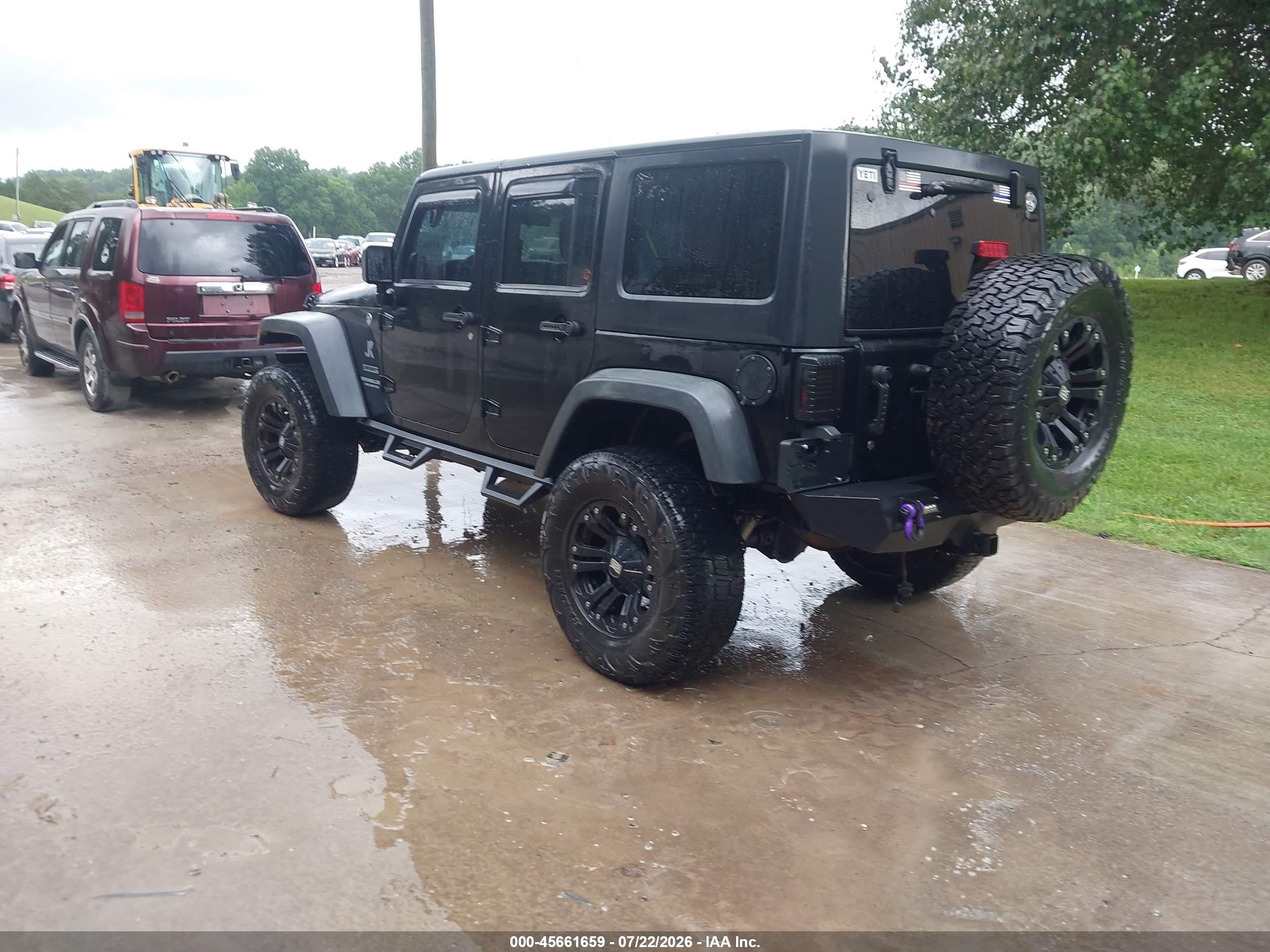 2012 Jeep Wrangler Unlimited Sport Black vin: 1C4BJWDG4CL234922