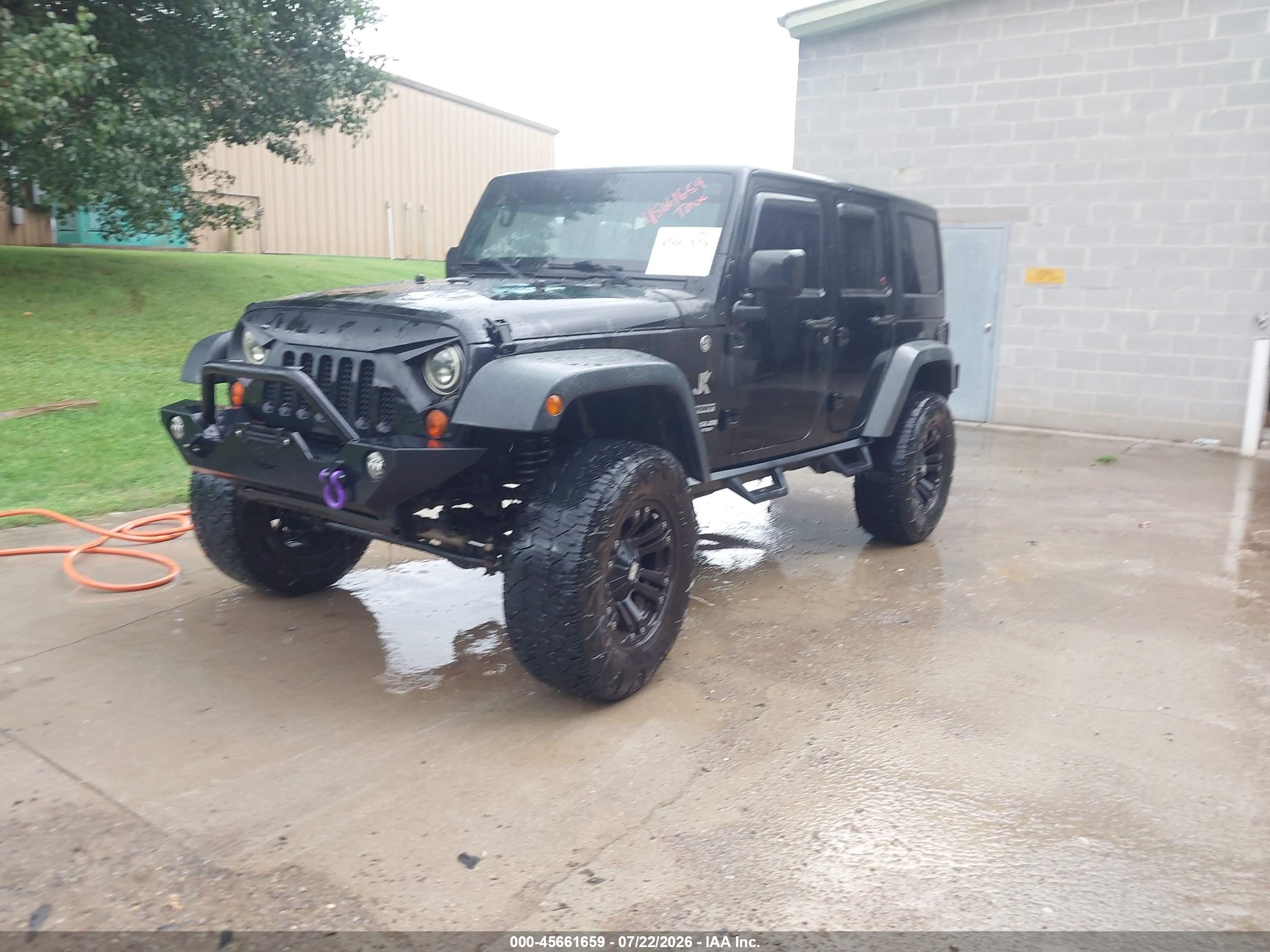 2012 Jeep Wrangler Unlimited Sport Black vin: 1C4BJWDG4CL234922