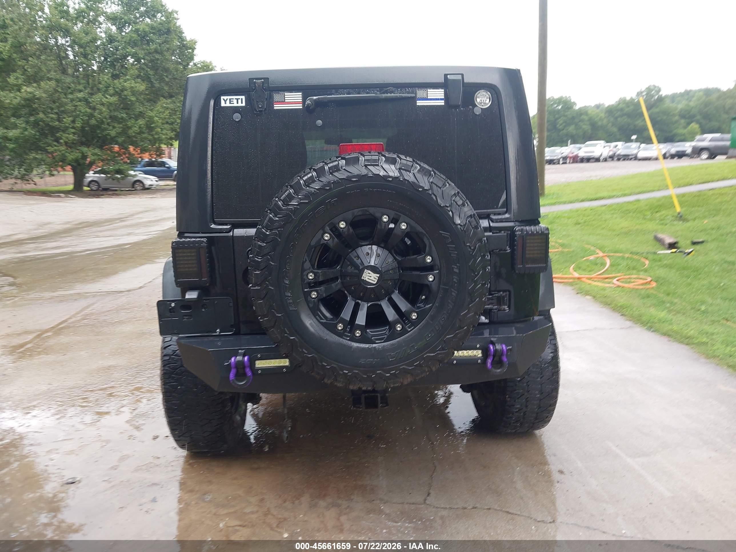 2012 Jeep Wrangler Unlimited Sport Black vin: 1C4BJWDG4CL234922