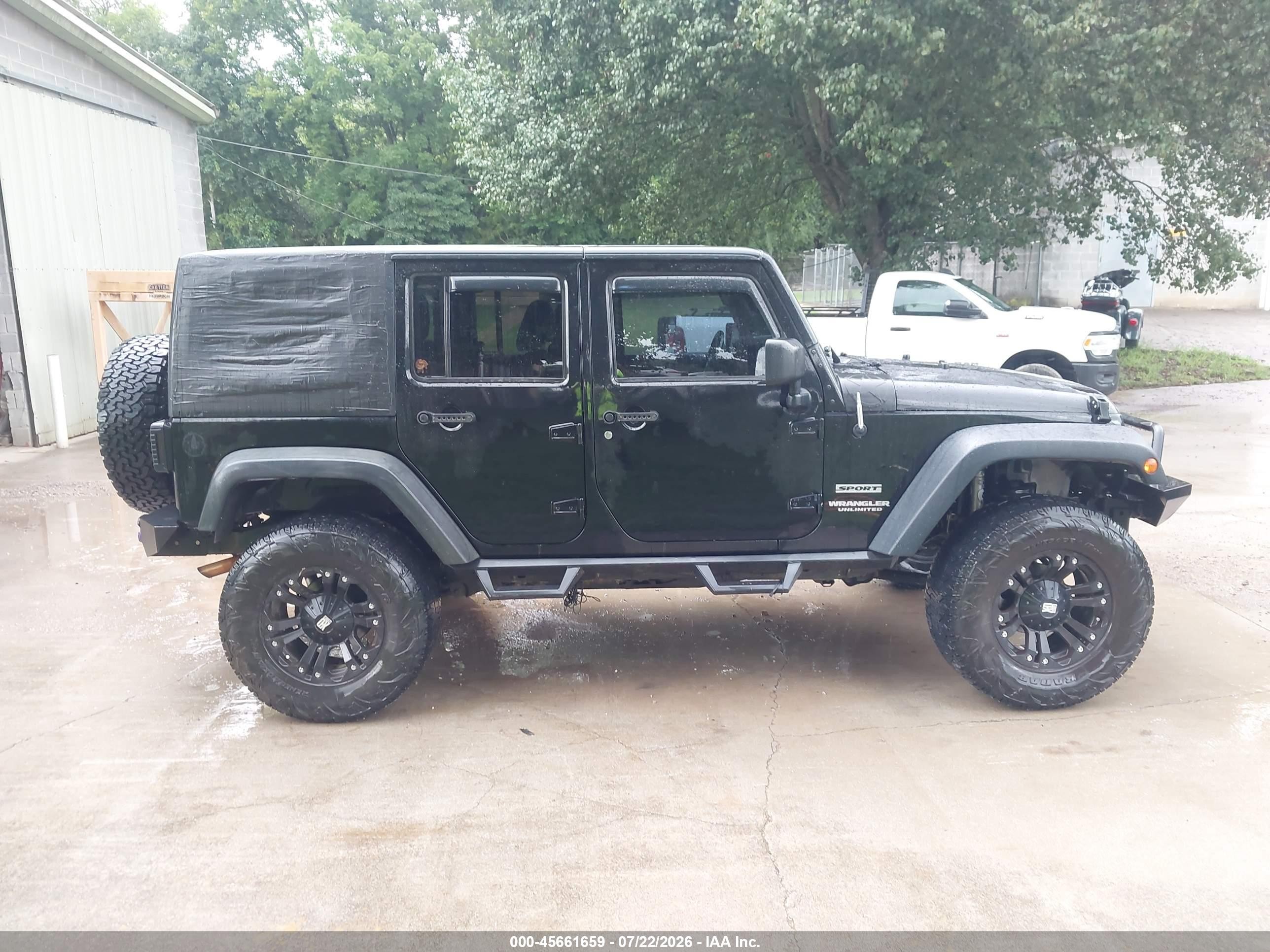 2012 Jeep Wrangler Unlimited Sport Black vin: 1C4BJWDG4CL234922