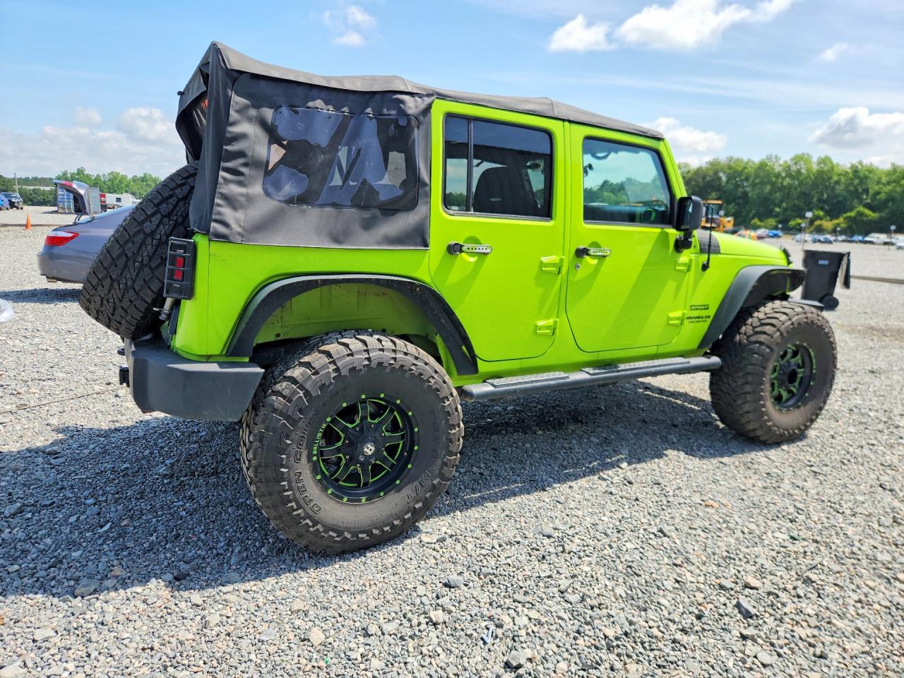 2012 Jeep Wrangler Unlimited Sport Green vin: 1C4BJWDG4CL235455
