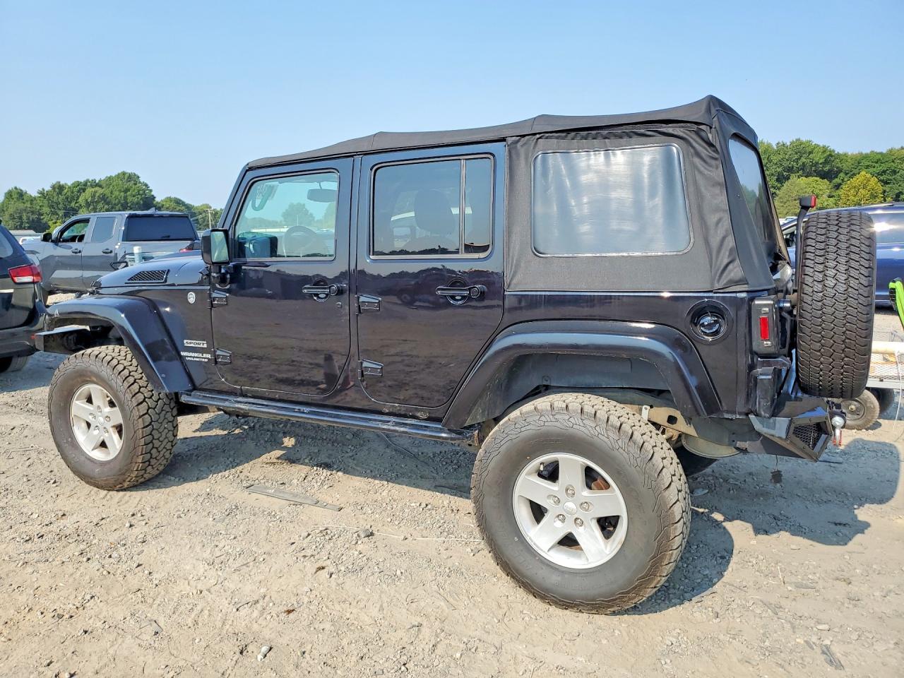 2015 Jeep Wrangler Unlimited Sport Черный vin: 1C4BJWDG4FL740772