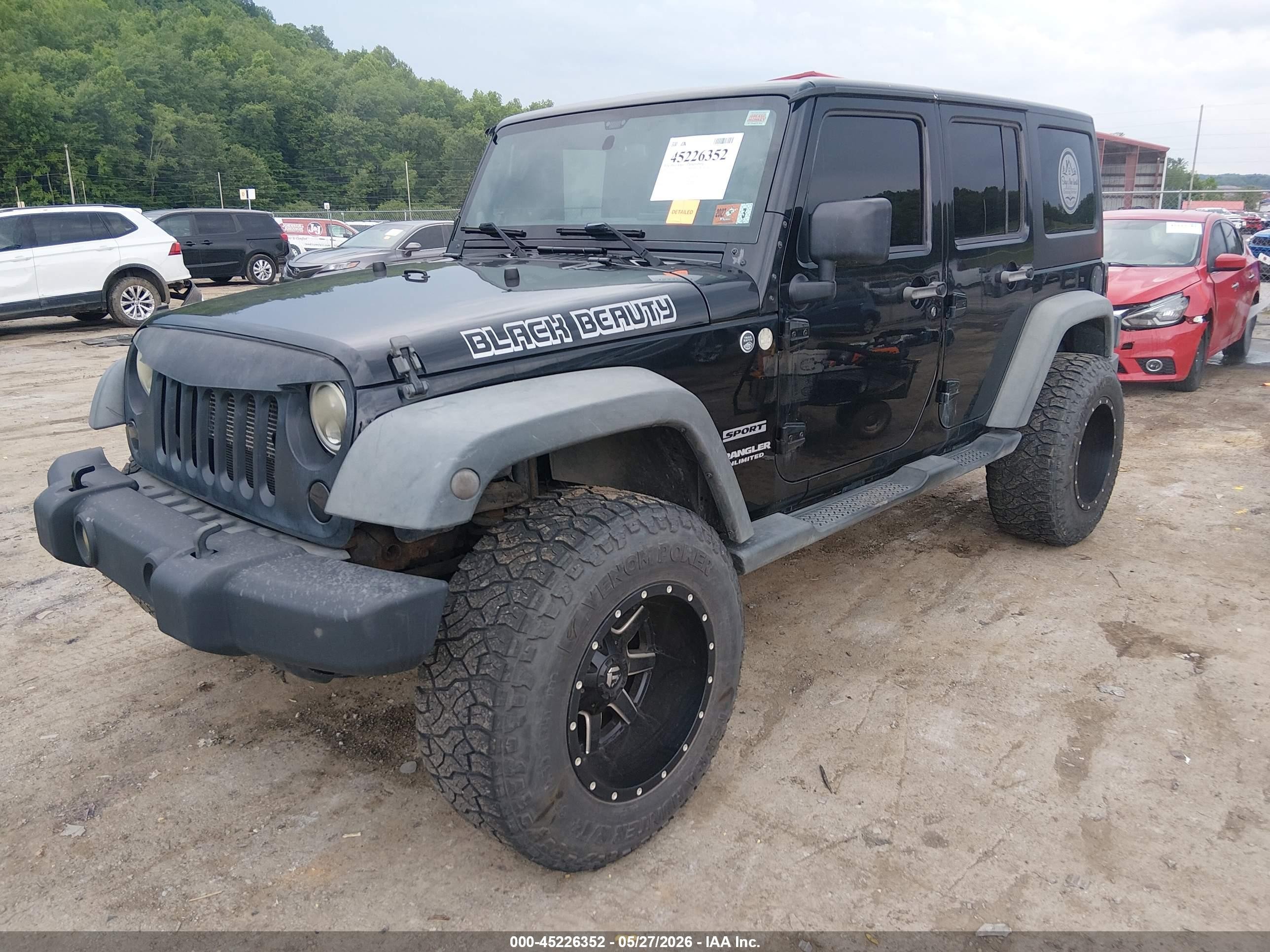 2012 Jeep Wrangler Unlimited Sport Black vin: 1C4BJWDG5CL141472