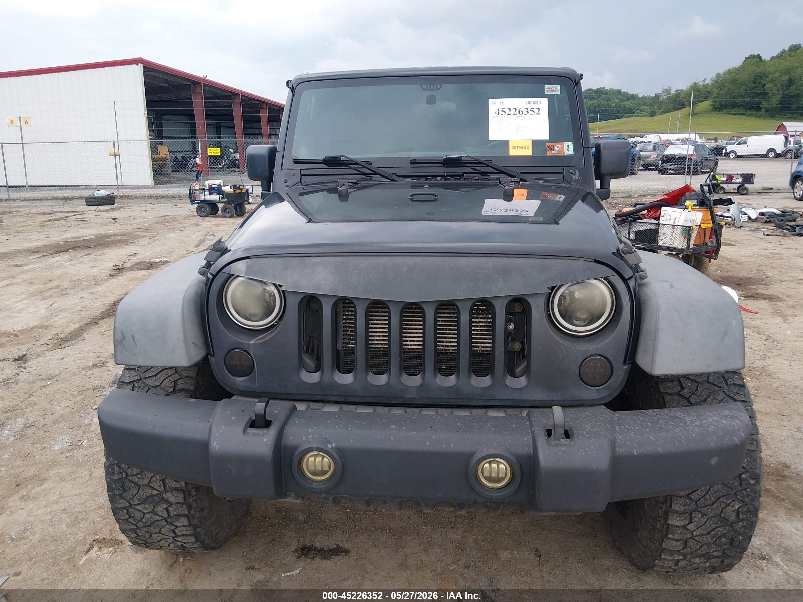 2012 Jeep Wrangler Unlimited Sport Black vin: 1C4BJWDG5CL141472