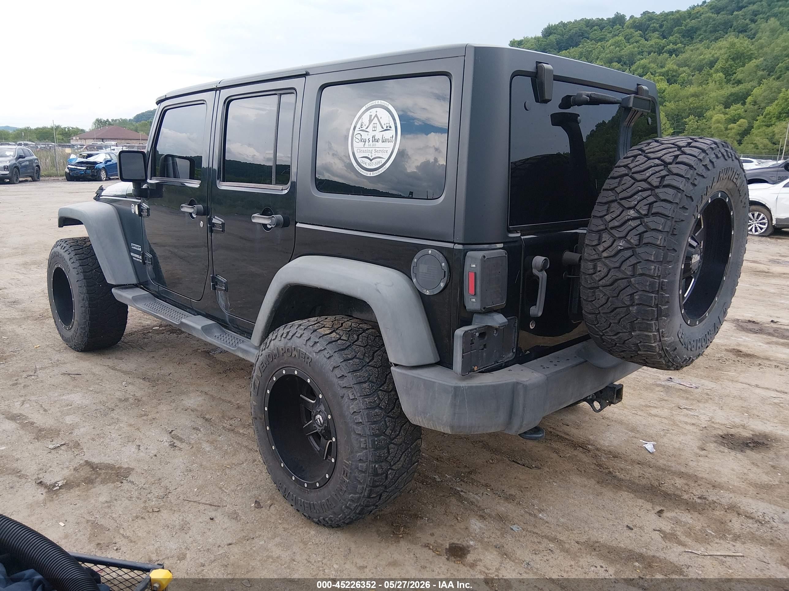 2012 Jeep Wrangler Unlimited Sport Black vin: 1C4BJWDG5CL141472