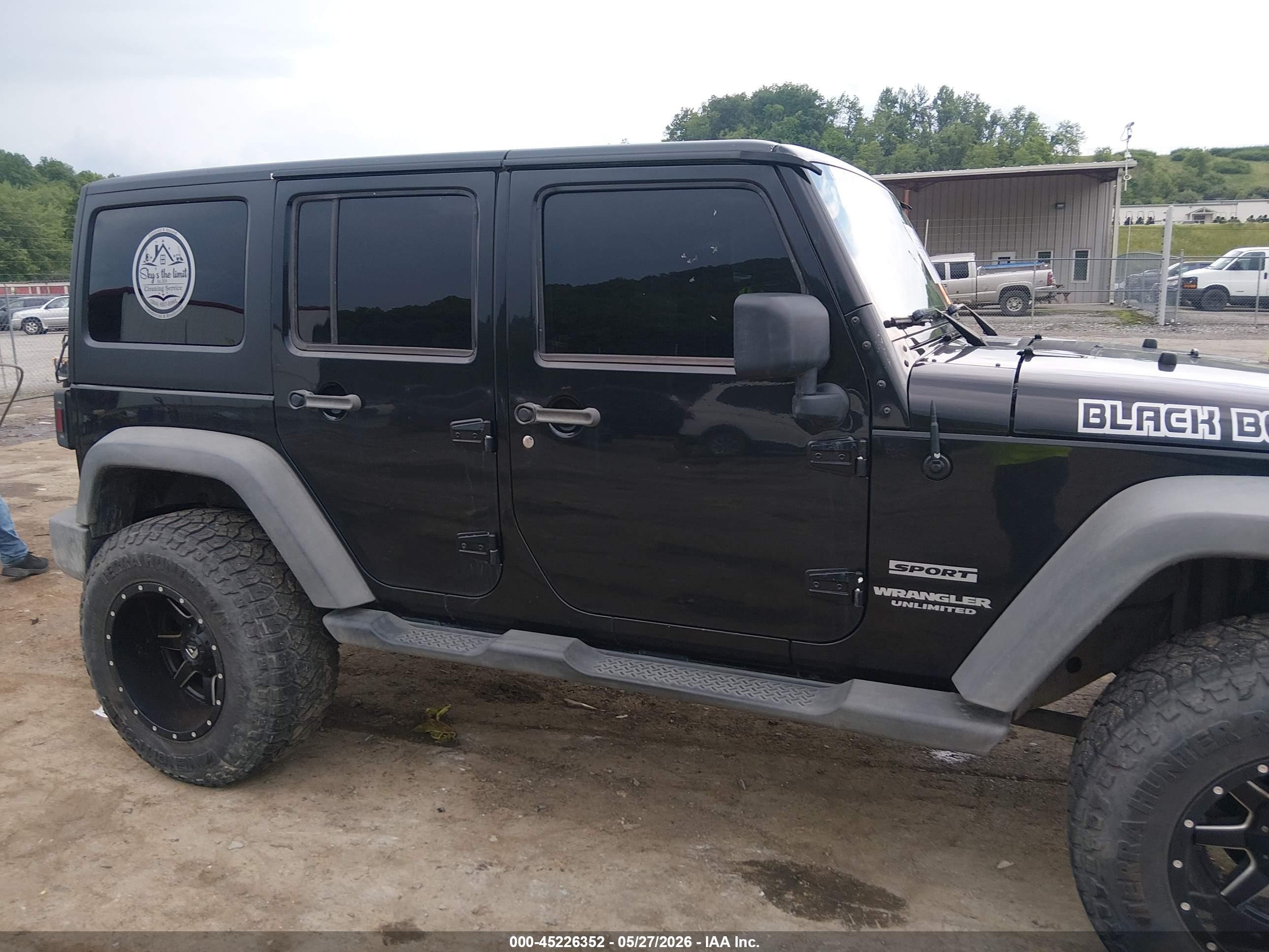 2012 Jeep Wrangler Unlimited Sport Black vin: 1C4BJWDG5CL141472