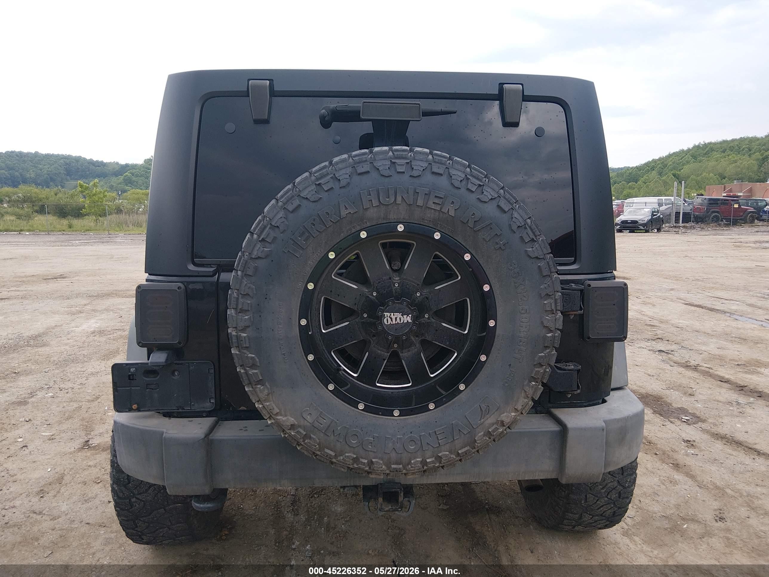 2012 Jeep Wrangler Unlimited Sport Black vin: 1C4BJWDG5CL141472
