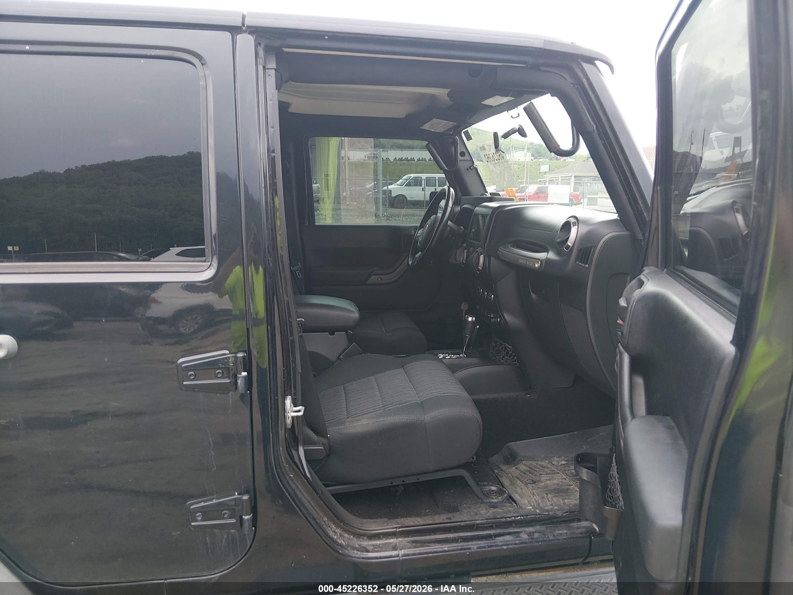 2012 Jeep Wrangler Unlimited Sport Black vin: 1C4BJWDG5CL141472