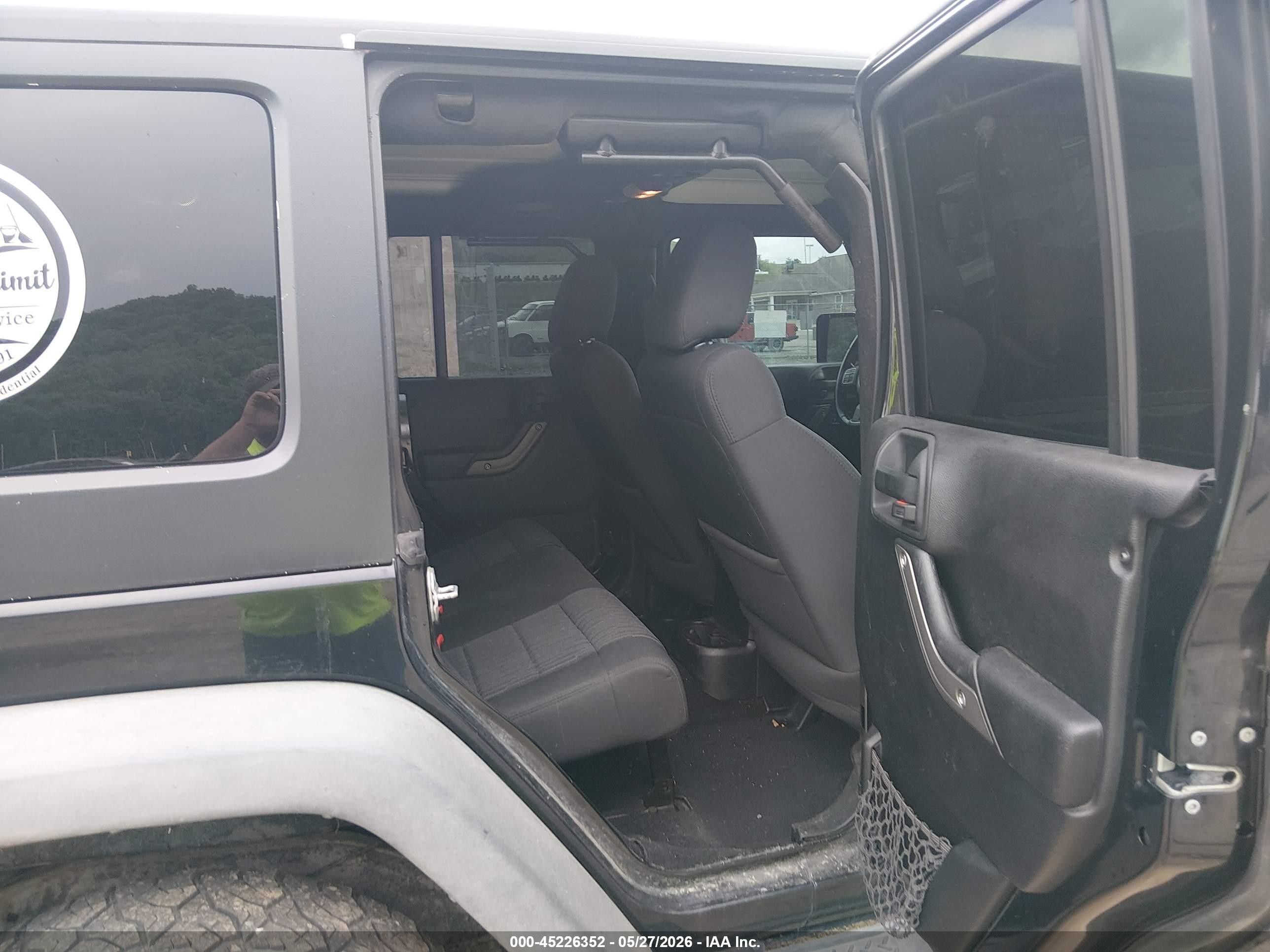 2012 Jeep Wrangler Unlimited Sport Black vin: 1C4BJWDG5CL141472